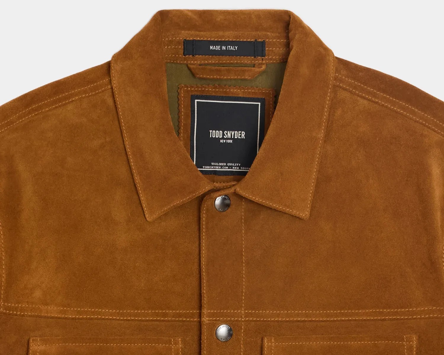 Brown suede jacket collar with metal snap buttons and "Todd Snyder" label inside.