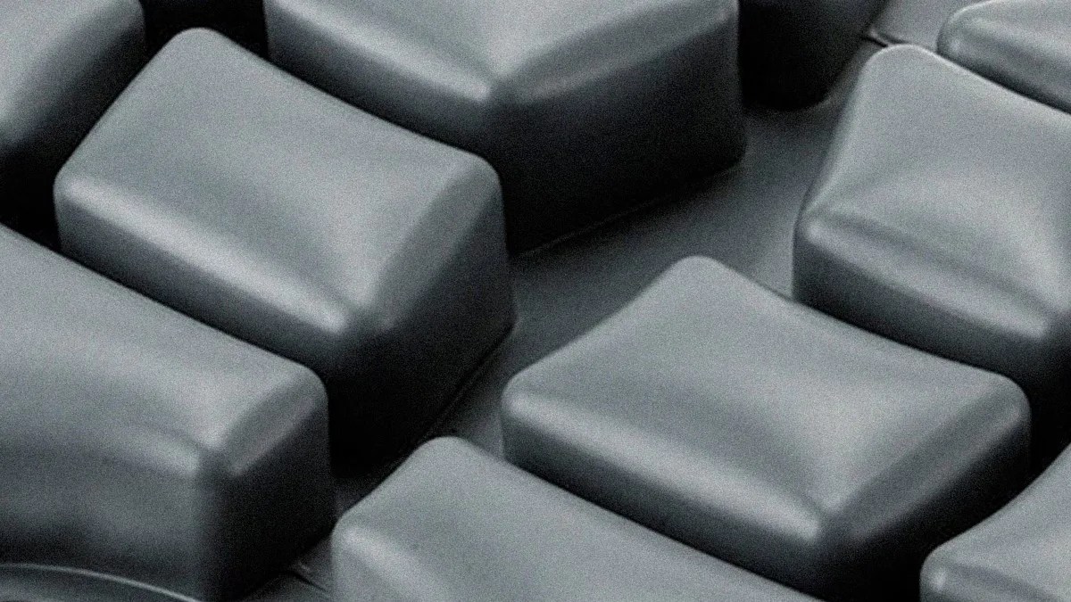 Close-up of black mechanical keyboard keycaps with a matte finish.