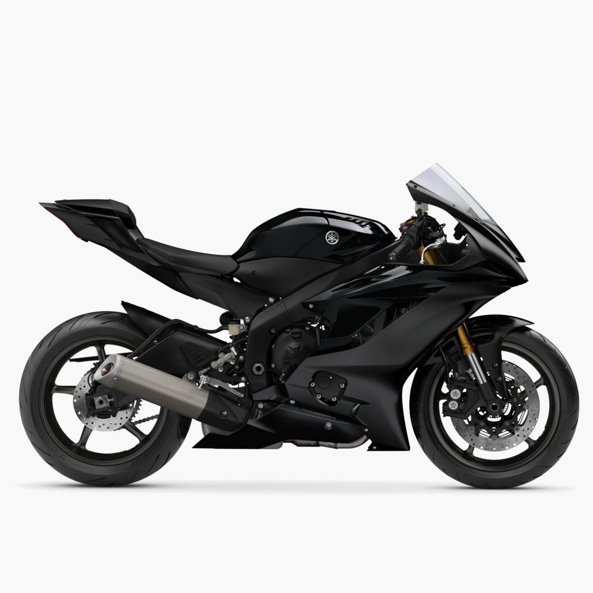 Glossy black Yamaha sport motorcycle with aerodynamic fairings and exposed exhaust pipe.