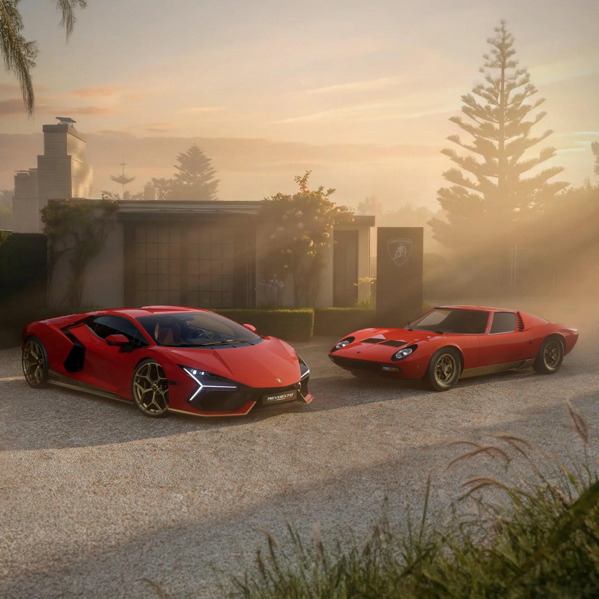 Two red Lamborghini sports cars parked outside a house with a Lamborghini sign in the background at sunset.