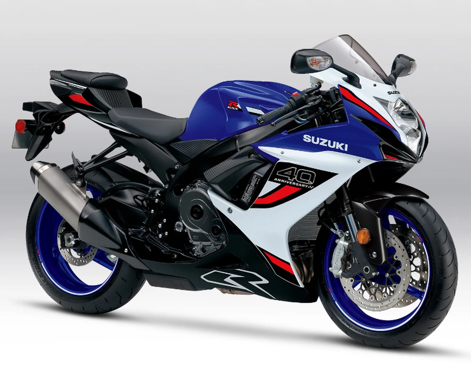 Blue, white, and black Suzuki sport motorcycle with "40 Anniversary" decal and blue rims.