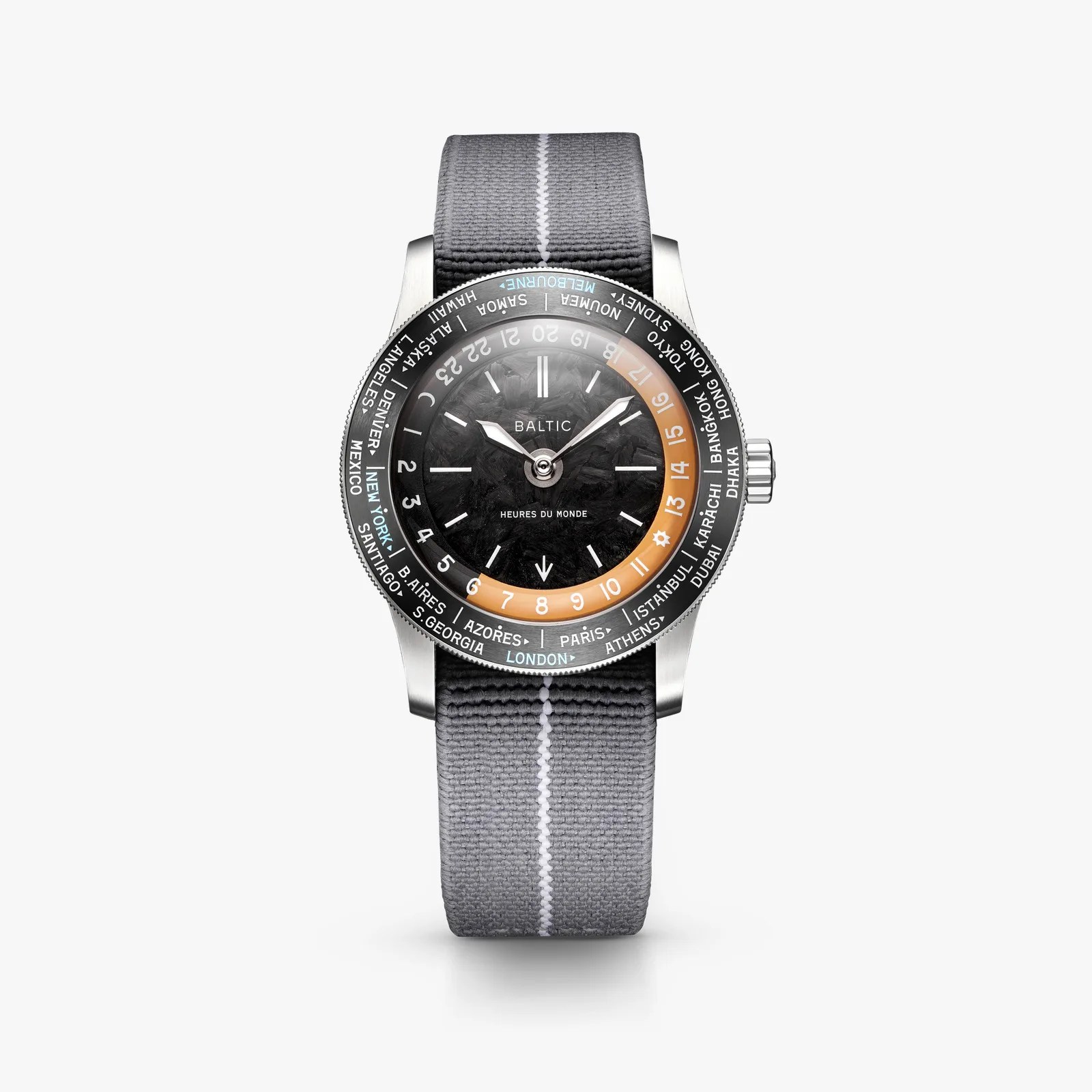 Round Baltic wristwatch with black textured dial, white hour markers, orange 24-hour ring, black bezel with city names, and gray fabric strap.