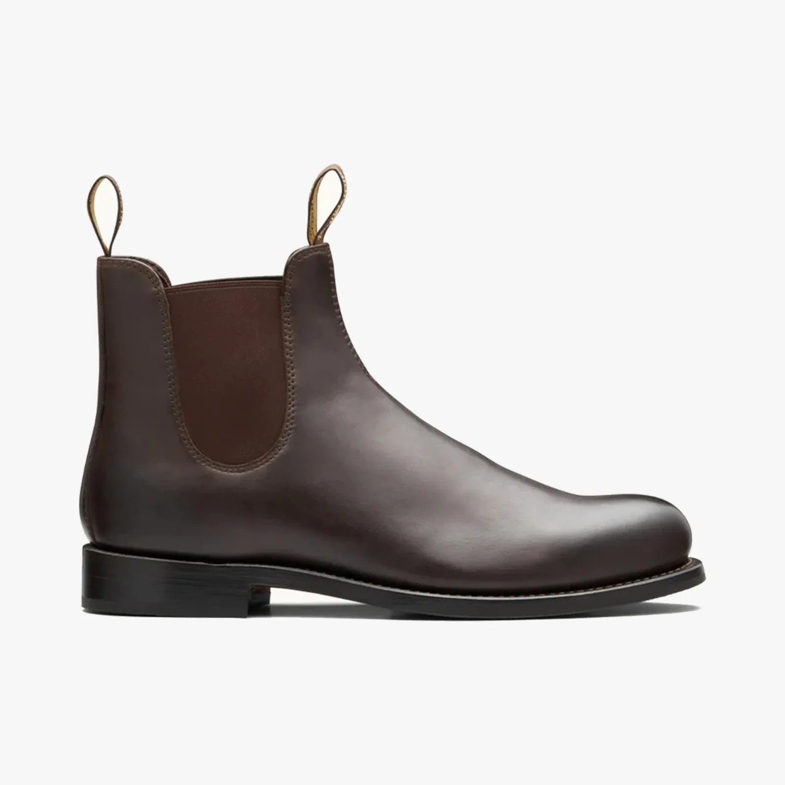 Dark brown leather Chelsea boot with elastic side panels and pull tabs on a white background.