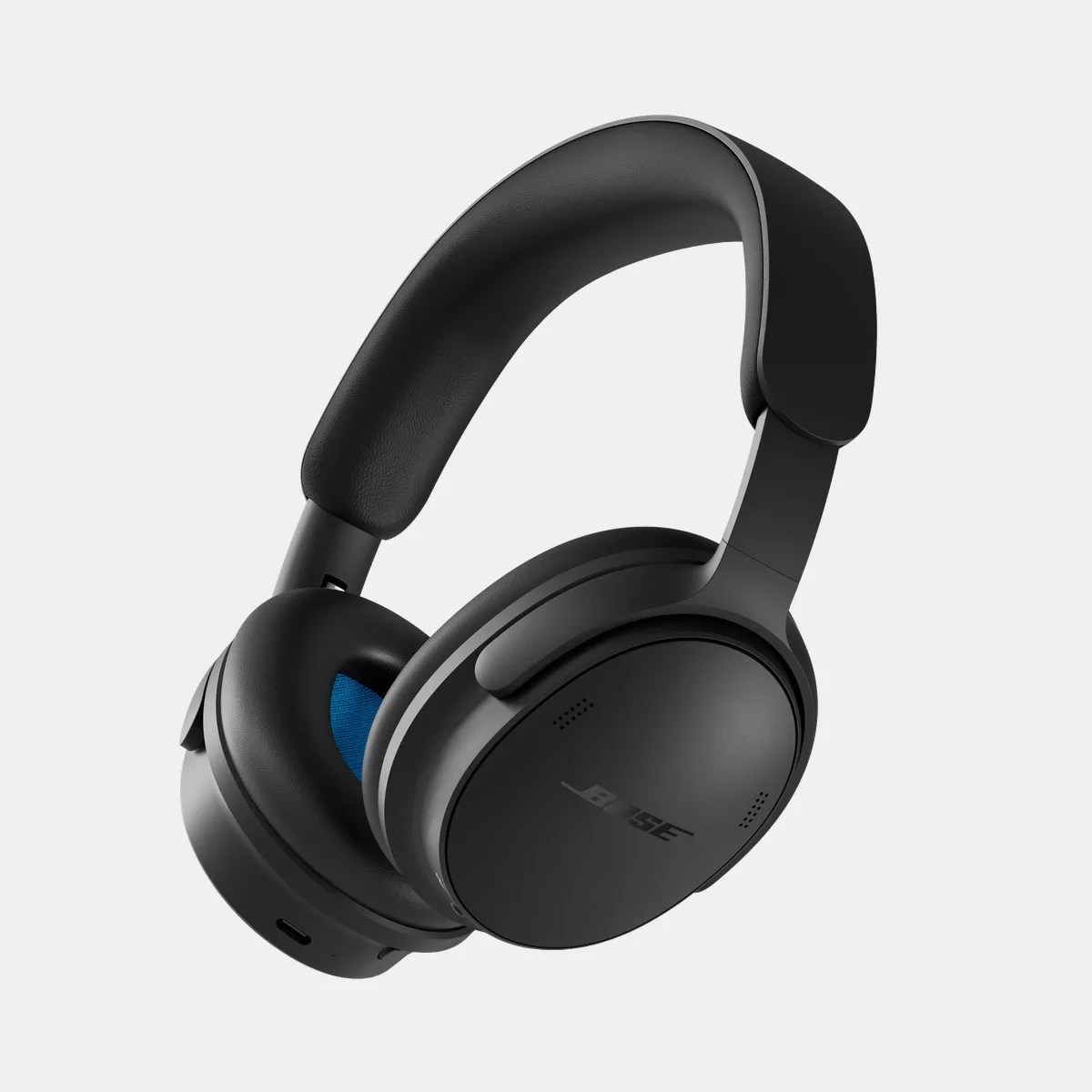 Black Bose over-ear wireless headphones with padded headband and blue inner ear cushions.