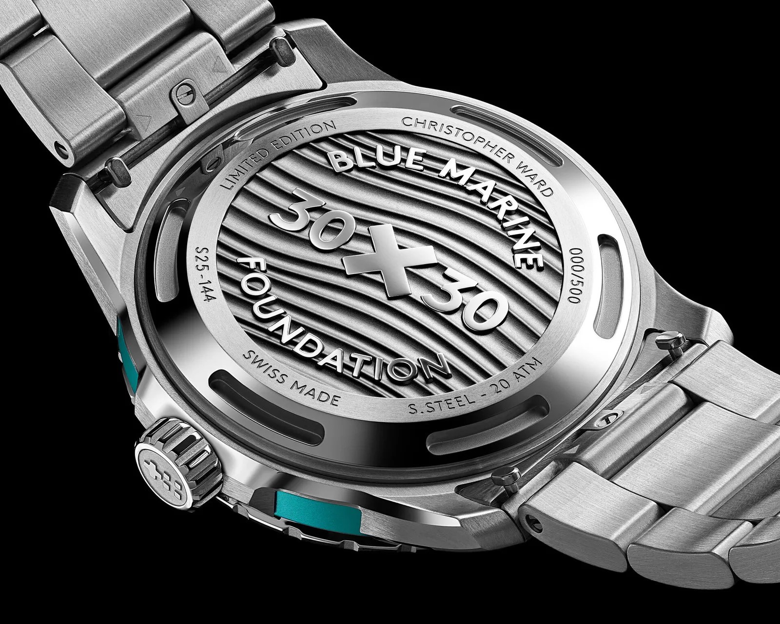 Close-up of the stainless steel back of a Christopher Ward Blue Marine 30x30 Foundation limited edition watch with wave pattern engraving.