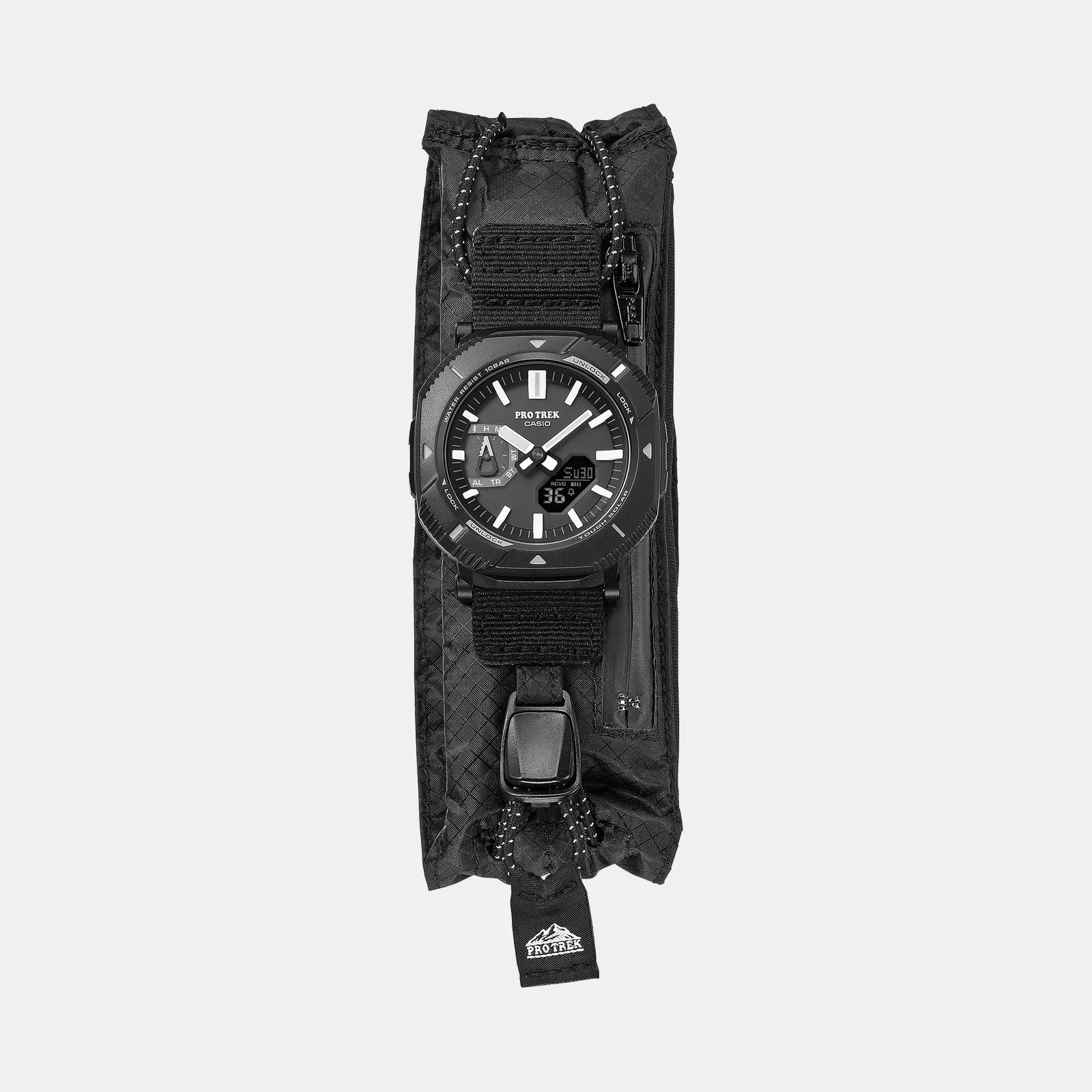 Black Casio Pro Trek analog-digital watch with fabric strap attached to a black zippered pouch.