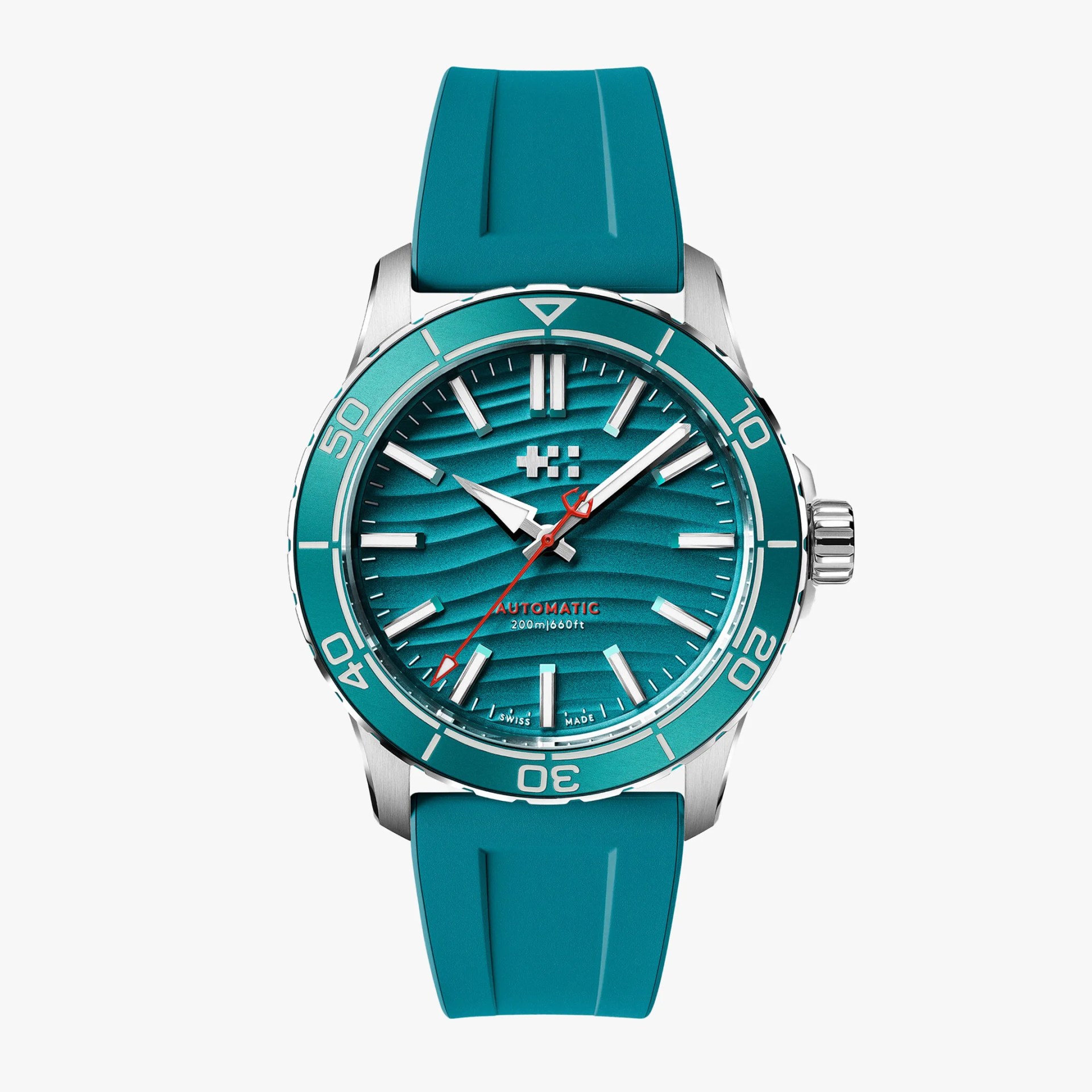 Teal dive watch with wave-patterned dial, silver markers, red second hand, and matching teal rubber strap.