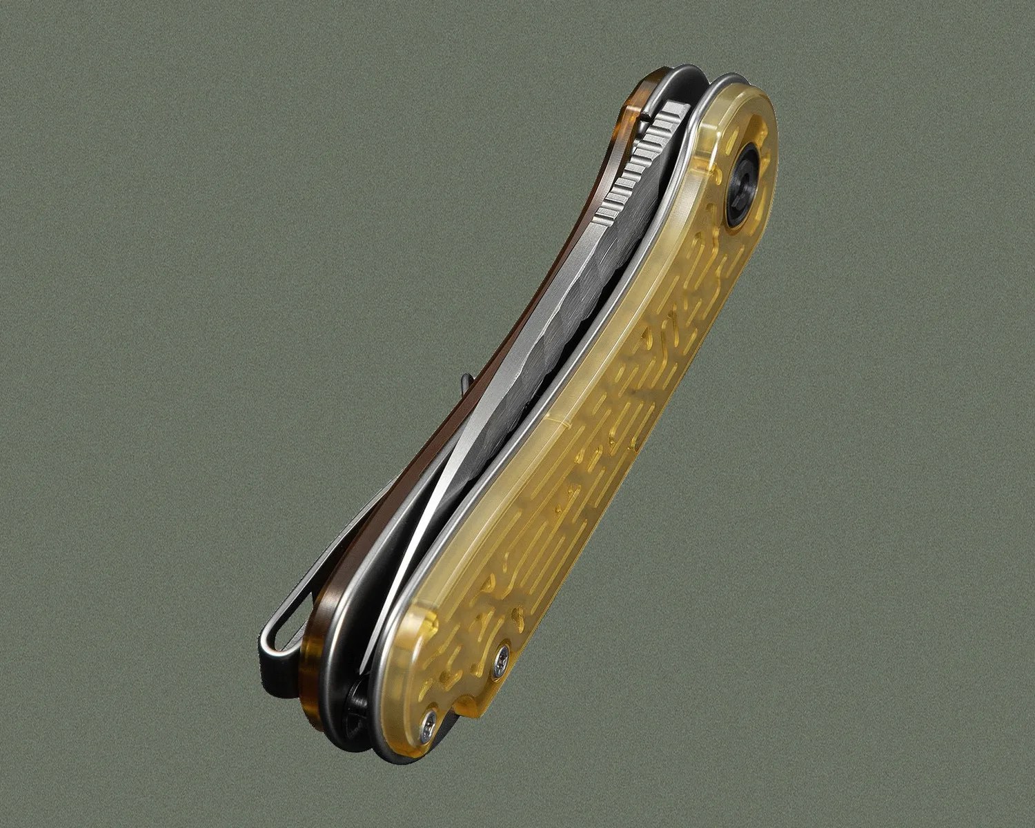 Folded pocket knife with a translucent amber handle and a visible textured metal blade spine.