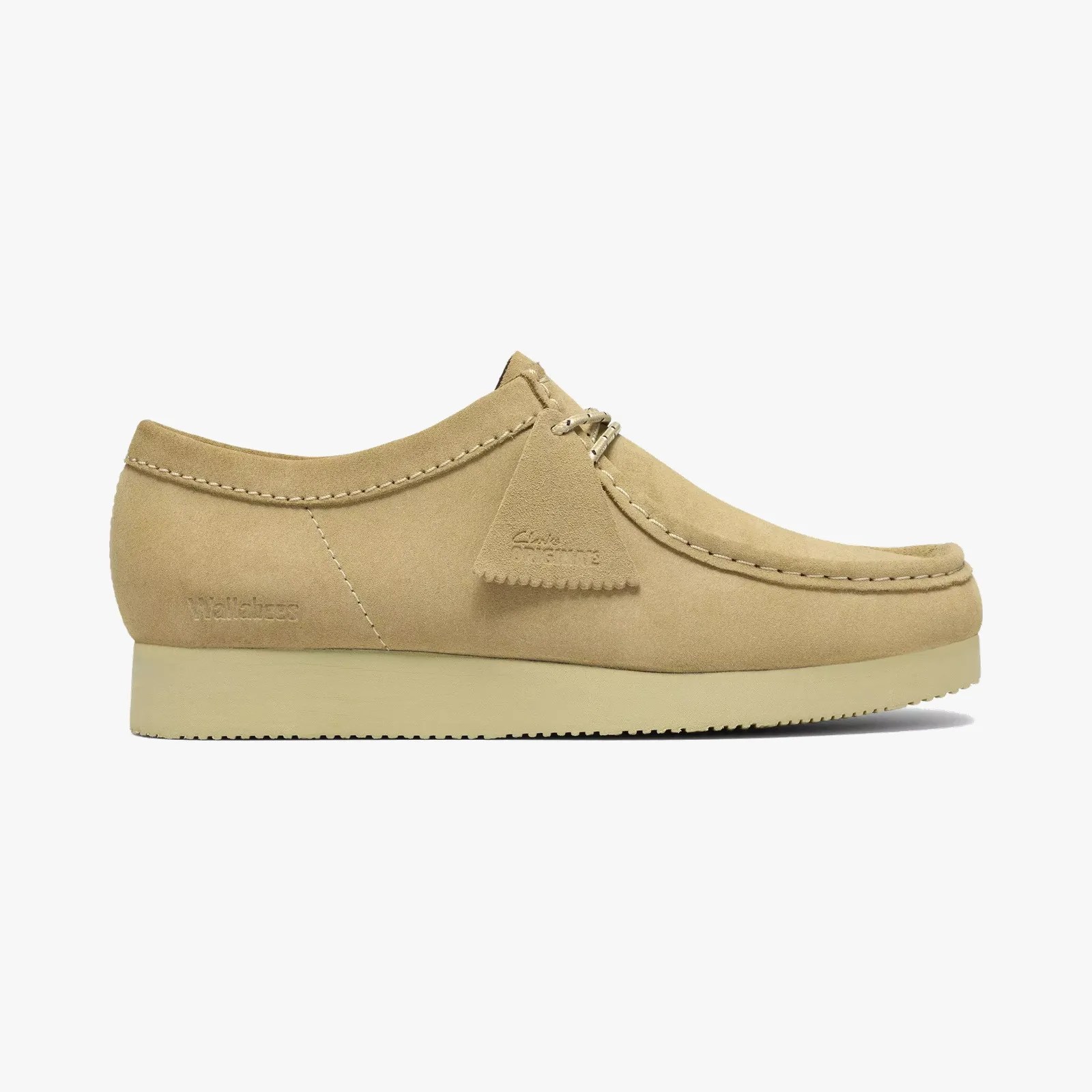 Beige suede Wallabee shoe with moccasin stitching and a matching beige sole.