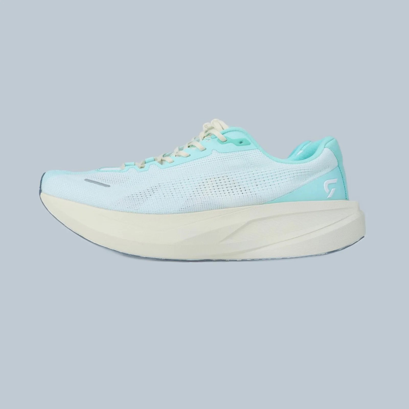 Light blue and white running shoe with thick cream sole and white laces on a gray background.