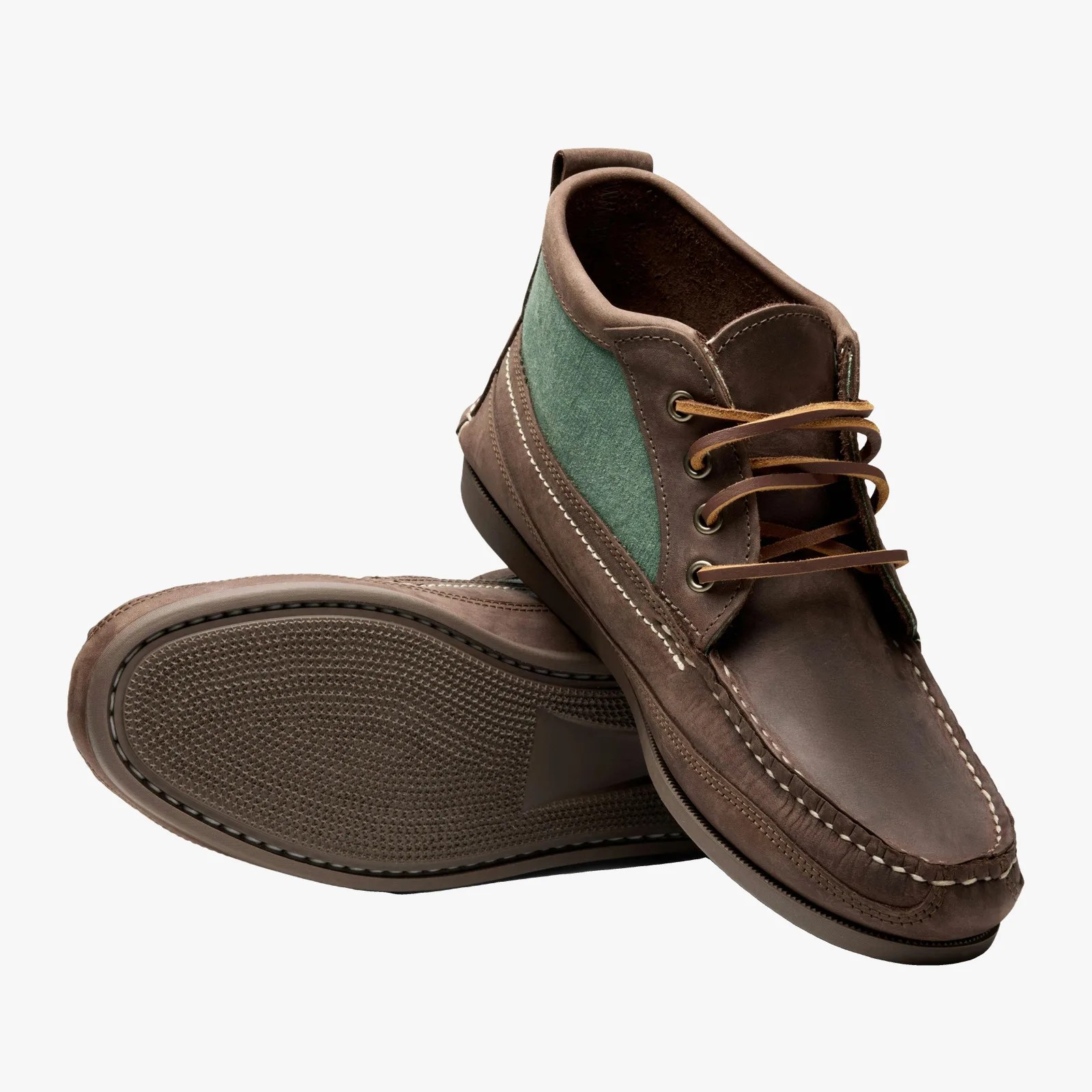 Brown leather and green fabric casual lace-up shoes with stitched detailing and textured rubber soles.