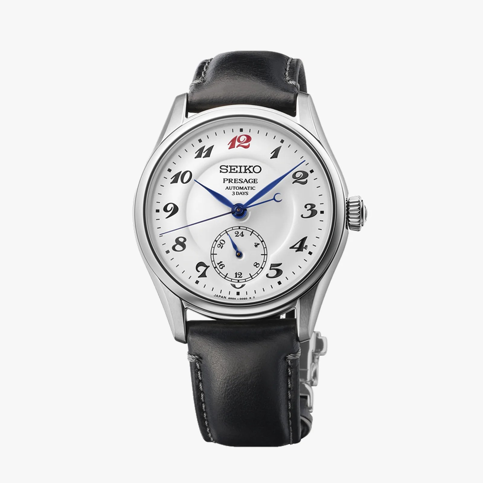 Seiko Presage automatic watch with white dial, black Arabic numerals, blue hands, and black leather strap.