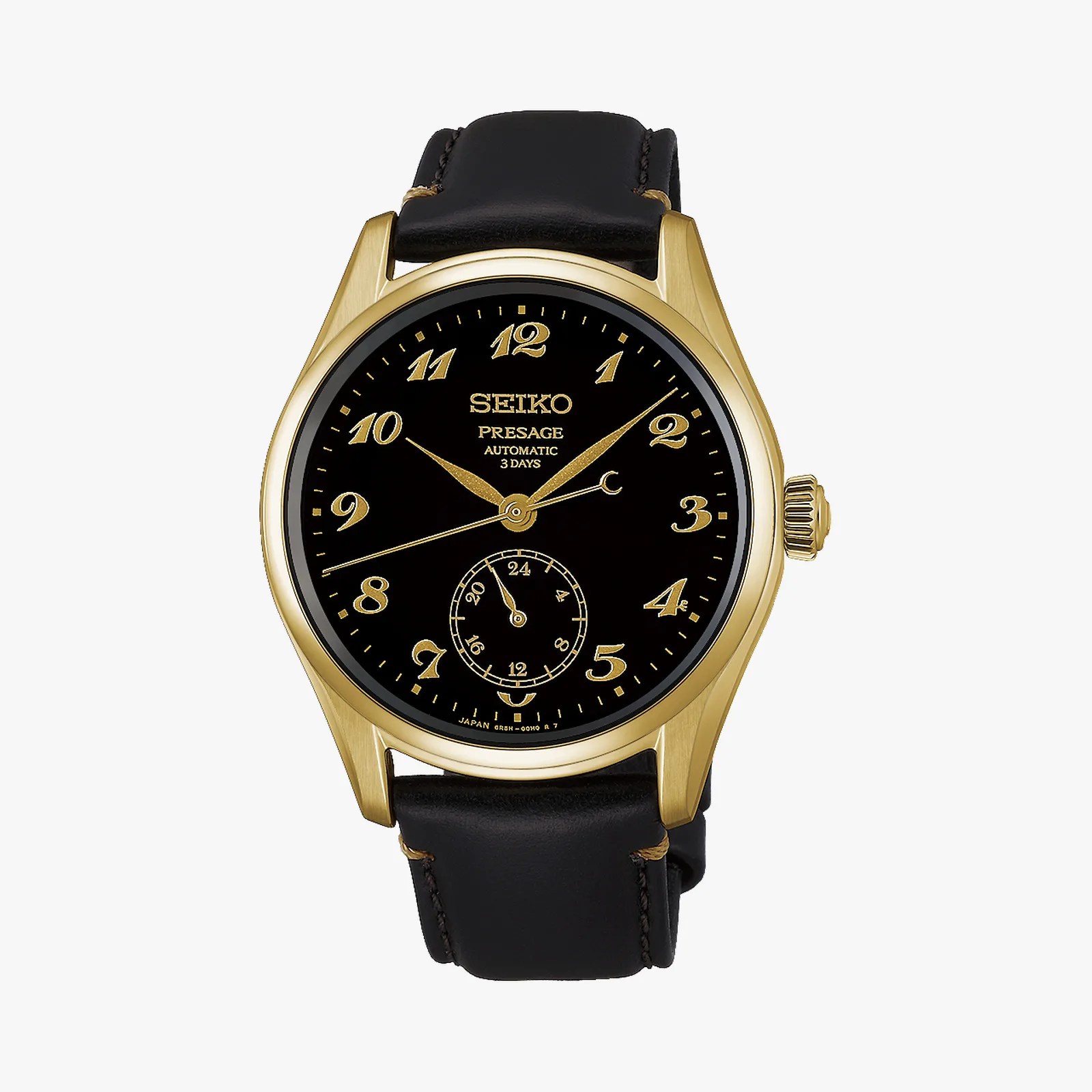 Gold Seiko Presage automatic wristwatch with black dial, gold numerals, and black leather strap.