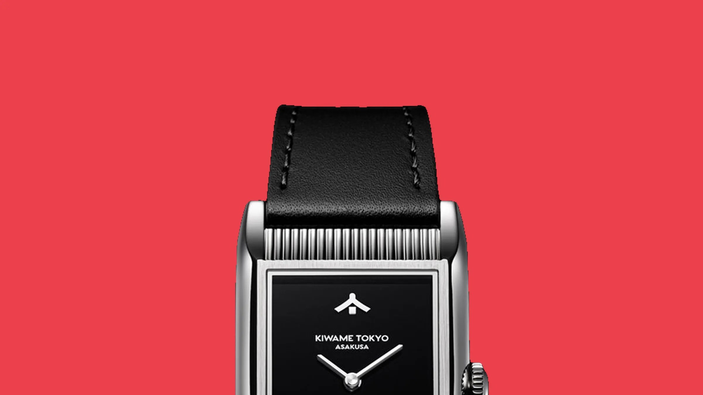 Rectangular silver watch with black leather strap and black dial displaying "KIWAME TOKYO ASAKUSA" on a red background.