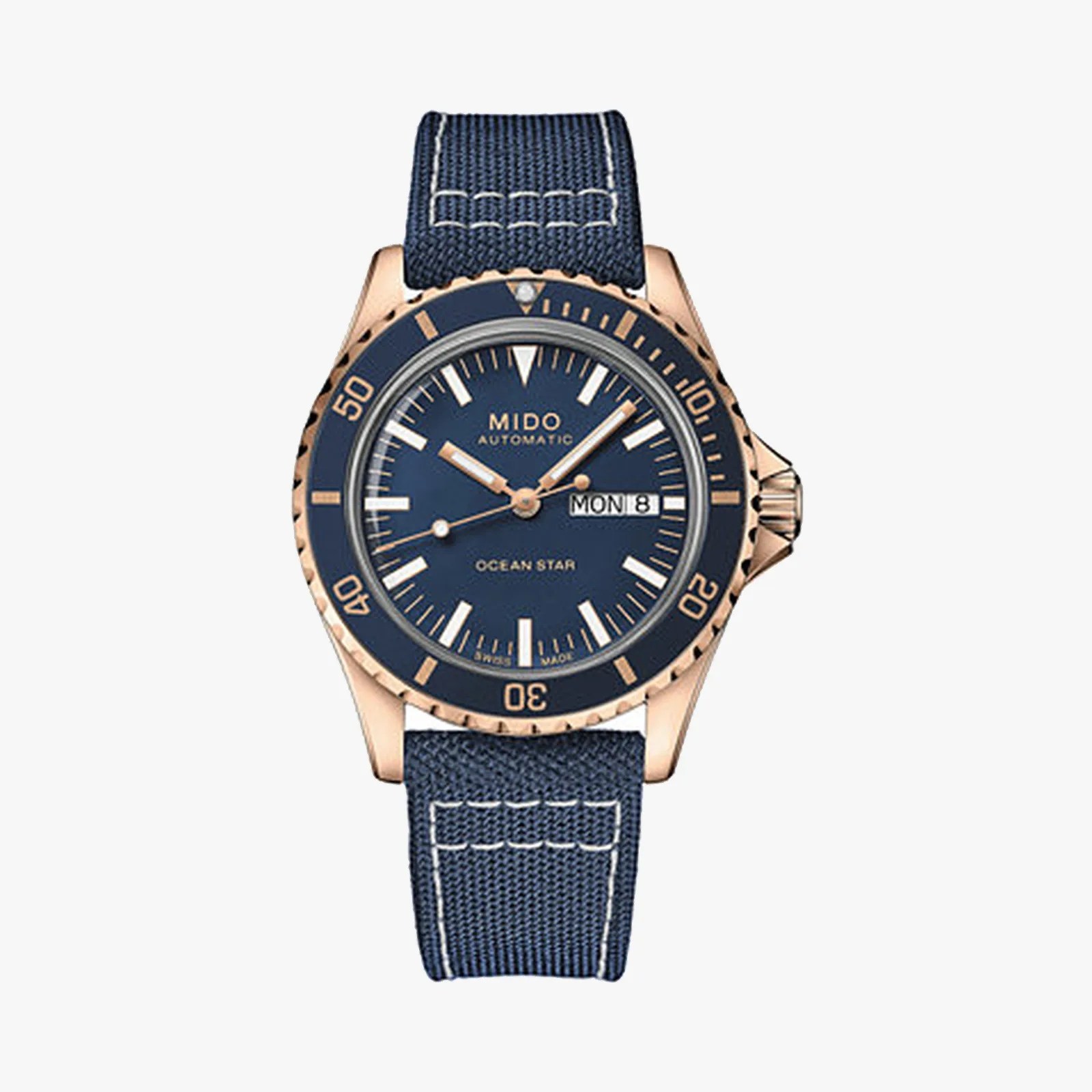 Blue dial Mido Ocean Star automatic watch with rose gold bezel and blue fabric strap.