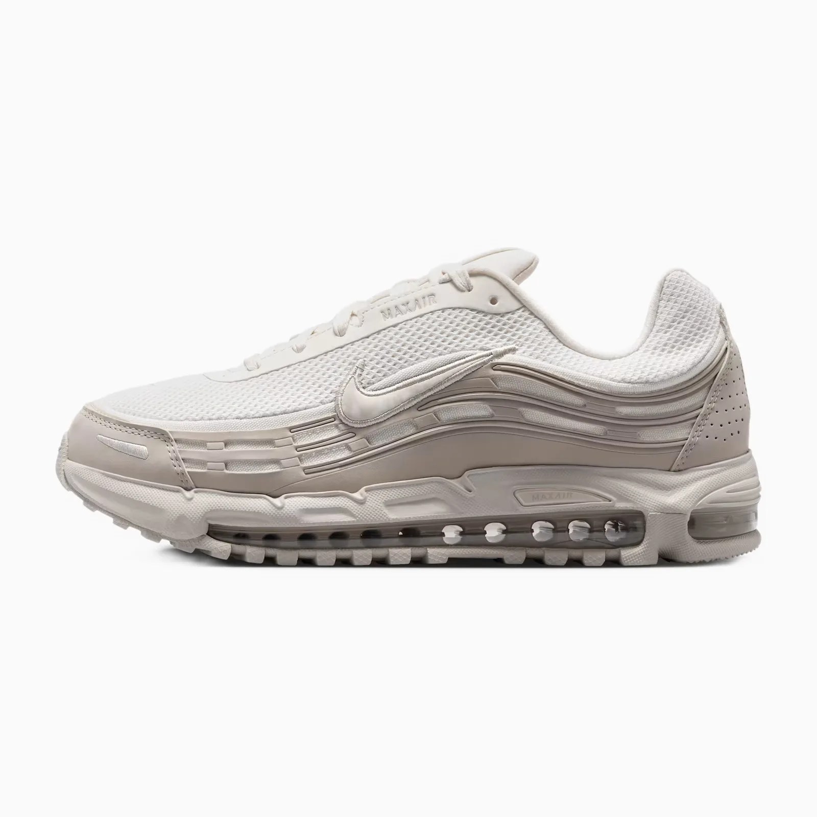 Off-white Nike Air Max sneaker with mesh upper, visible air sole unit, and textured rubber outsole.
