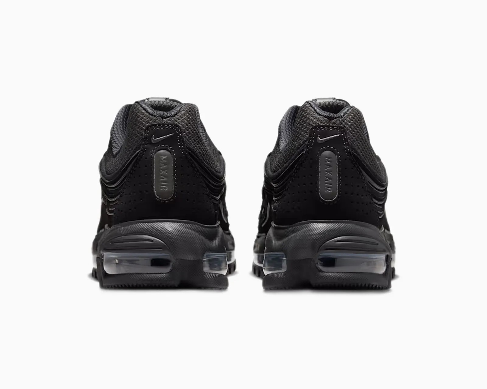 Pair of black Nike Air Max sneakers shown from the back with visible air cushioning in the soles.