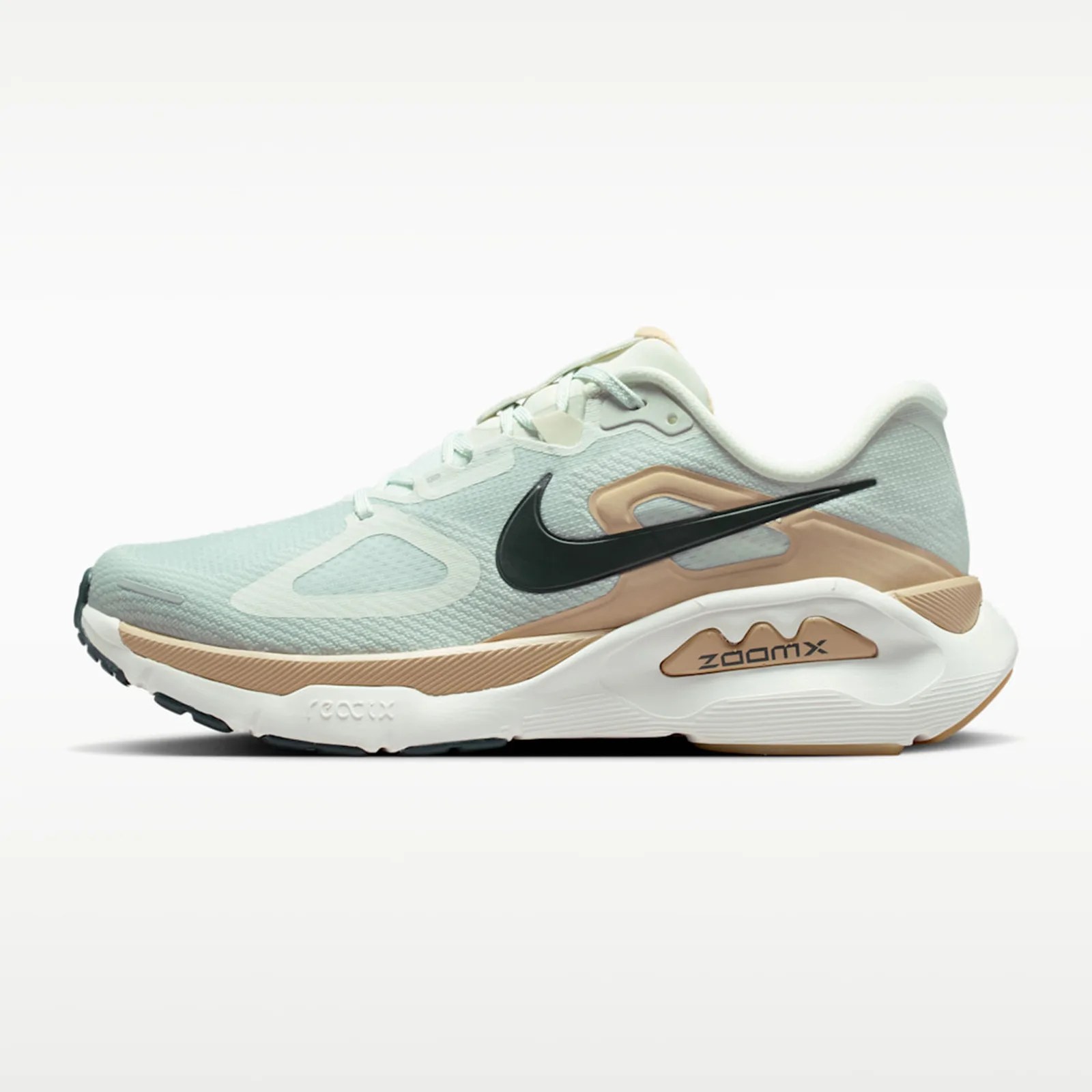 Light blue and beige Nike ZoomX running shoe with black swoosh logo on white background.