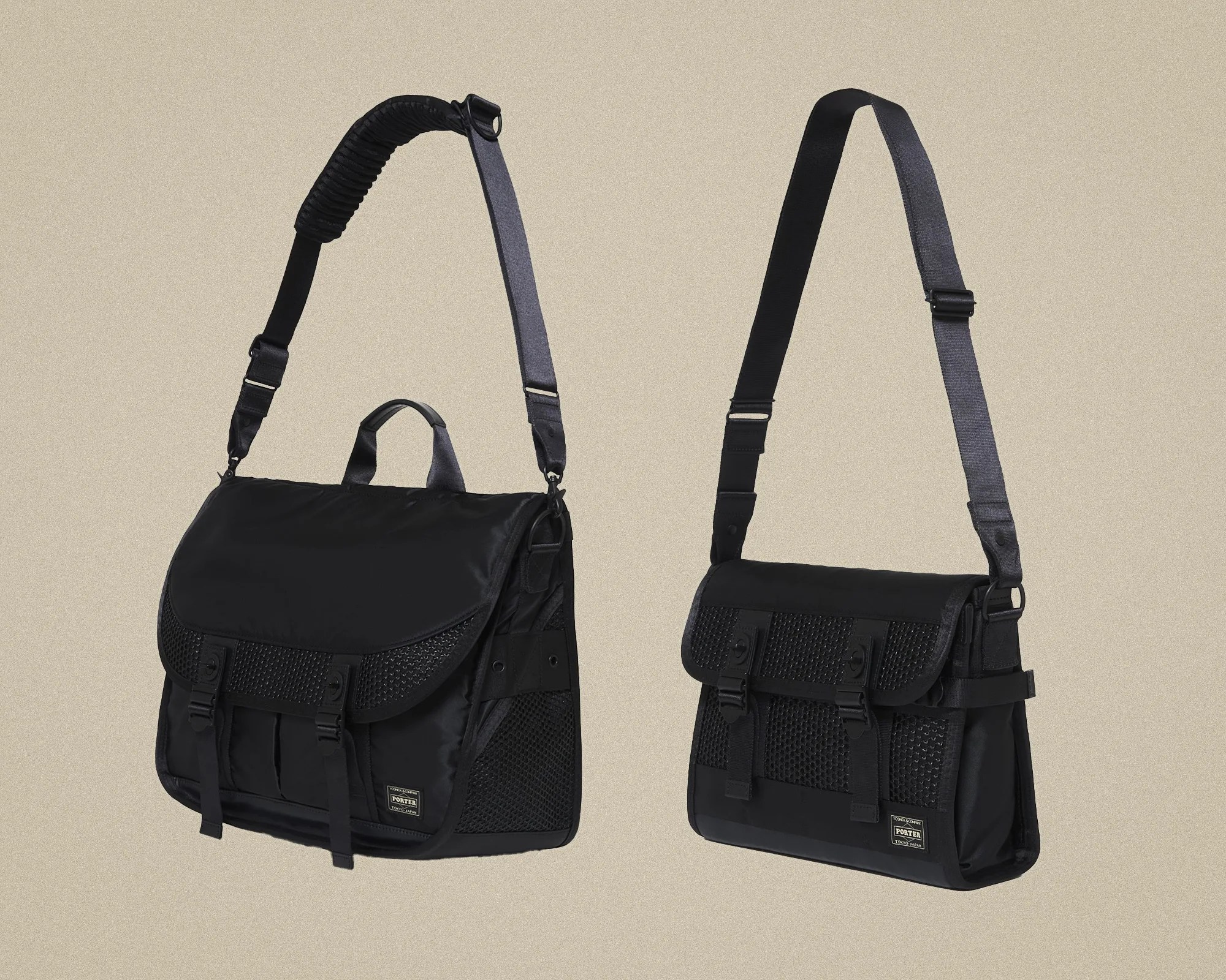 Two black messenger bags with adjustable shoulder straps and mesh front pockets on a beige background.
