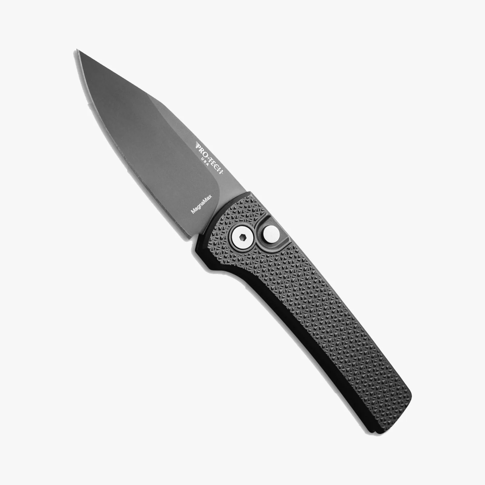 Black folding knife with textured handle and partially serrated blade marked "Pro-Tech USA" and "MagnaMax.