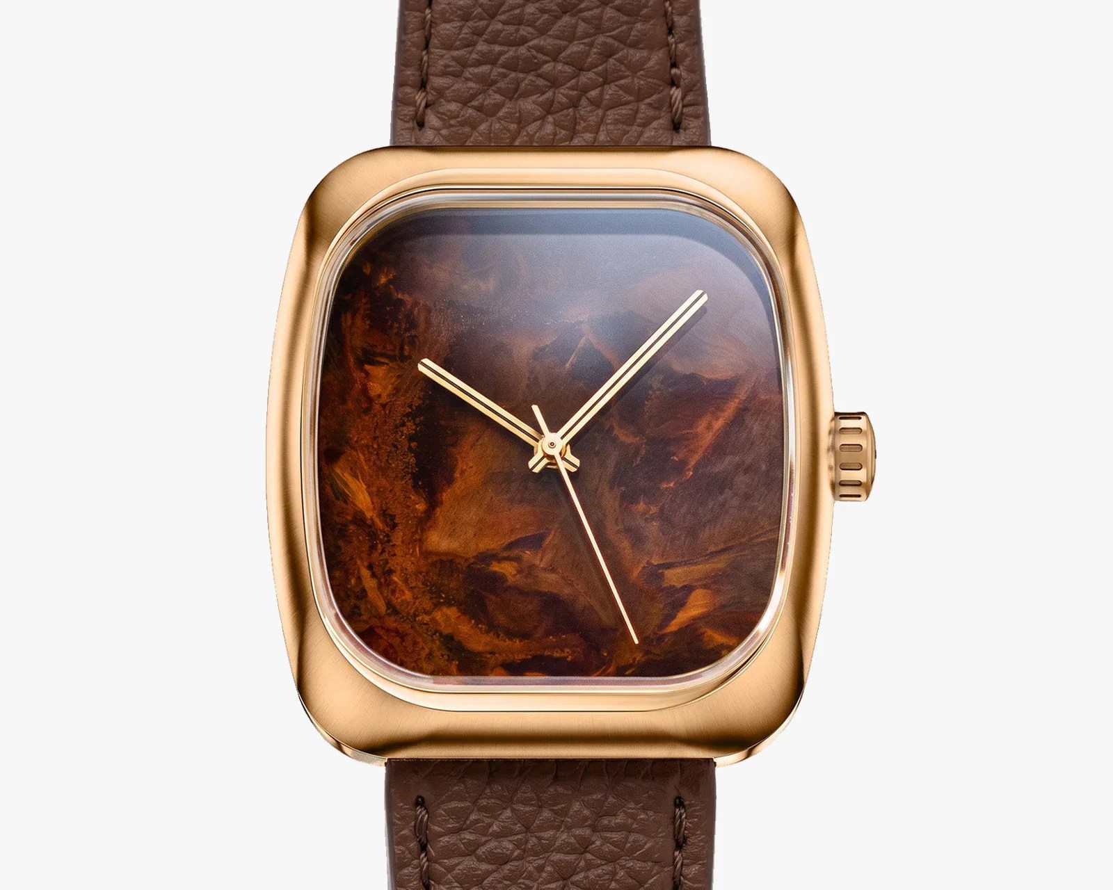 Square gold watch with a brown marbled dial and brown textured leather strap.