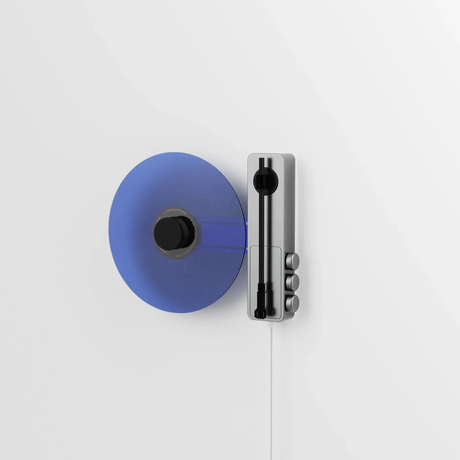 Wall-mounted modern turntable with a spinning blue vinyl record and a sleek silver tonearm.