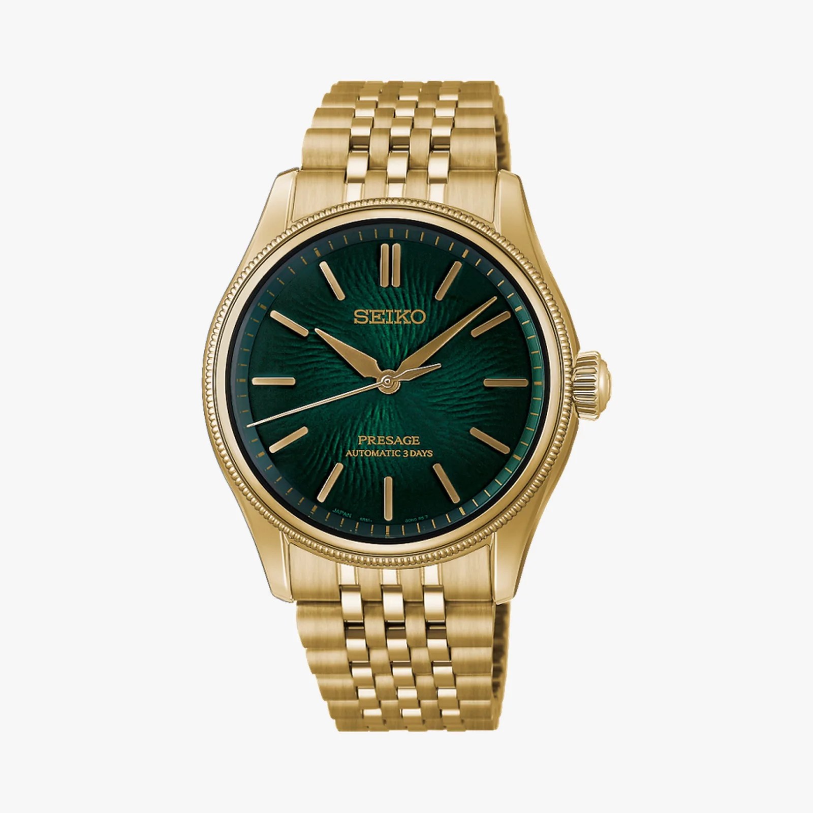 Gold Seiko Presage watch with green textured dial and gold metal link bracelet.