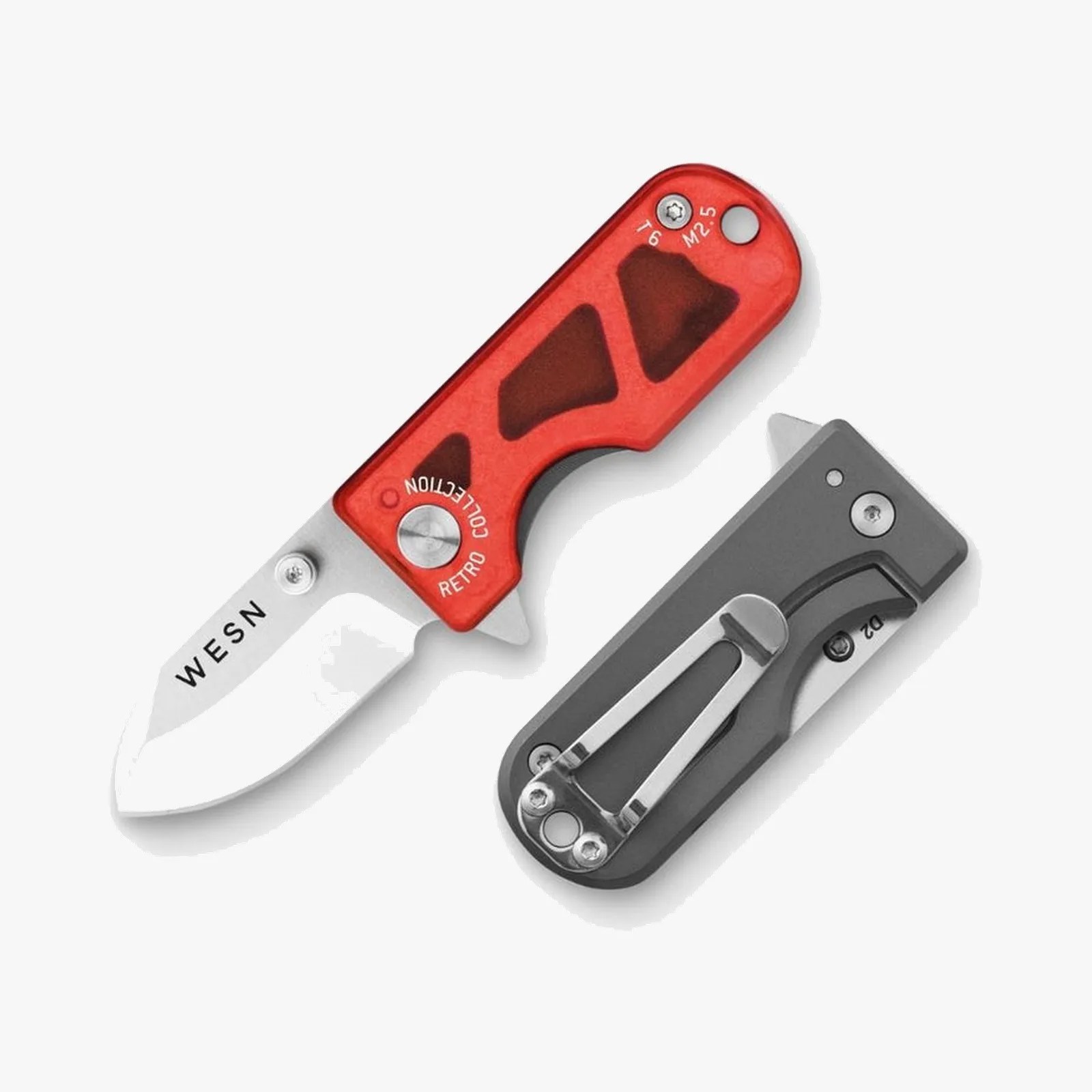 Red-handled folding knife with a silver blade marked "WESN" and a gray clip on the back side.