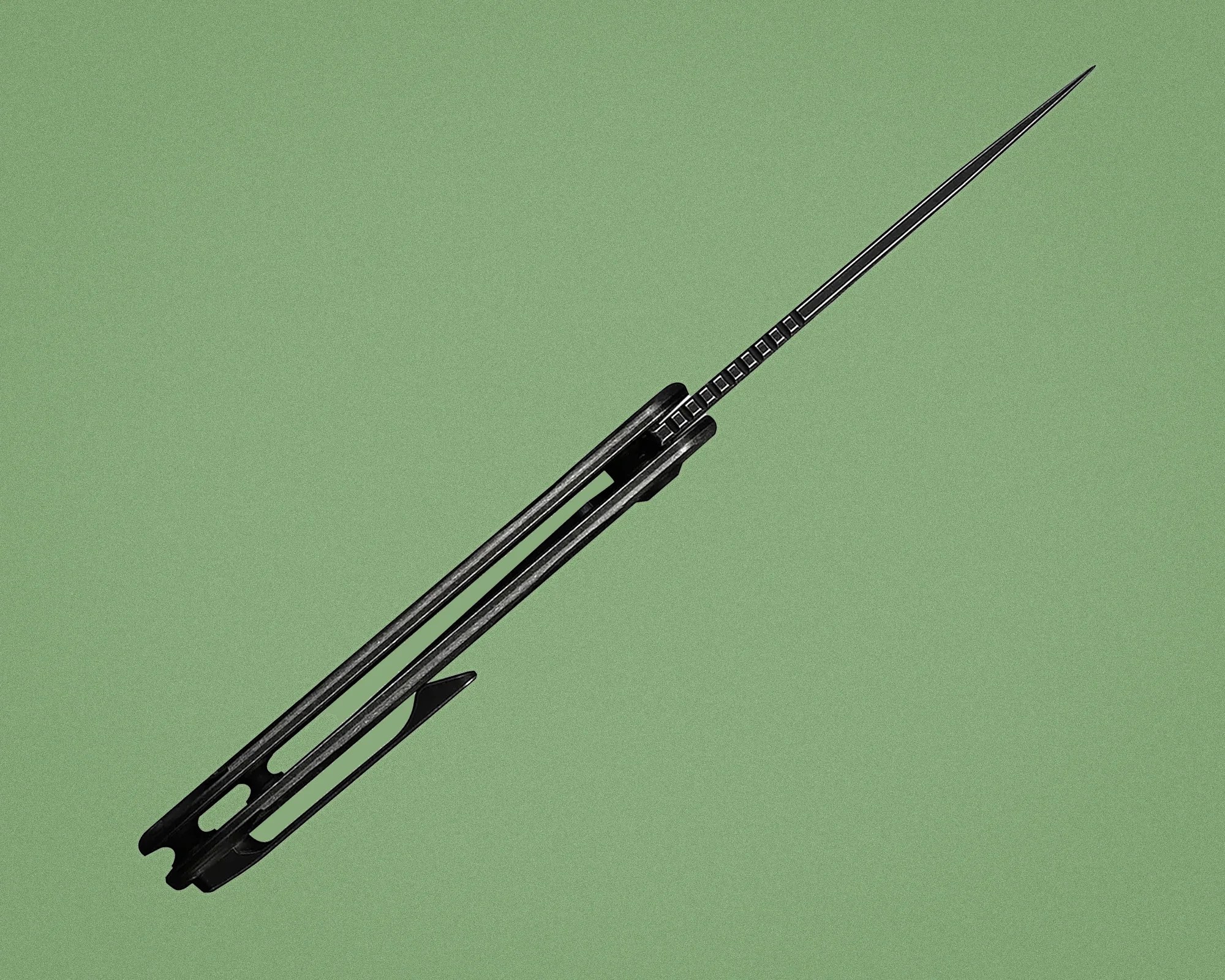 Black carbon fiber arrow shaft with a pointed tip on a green background.