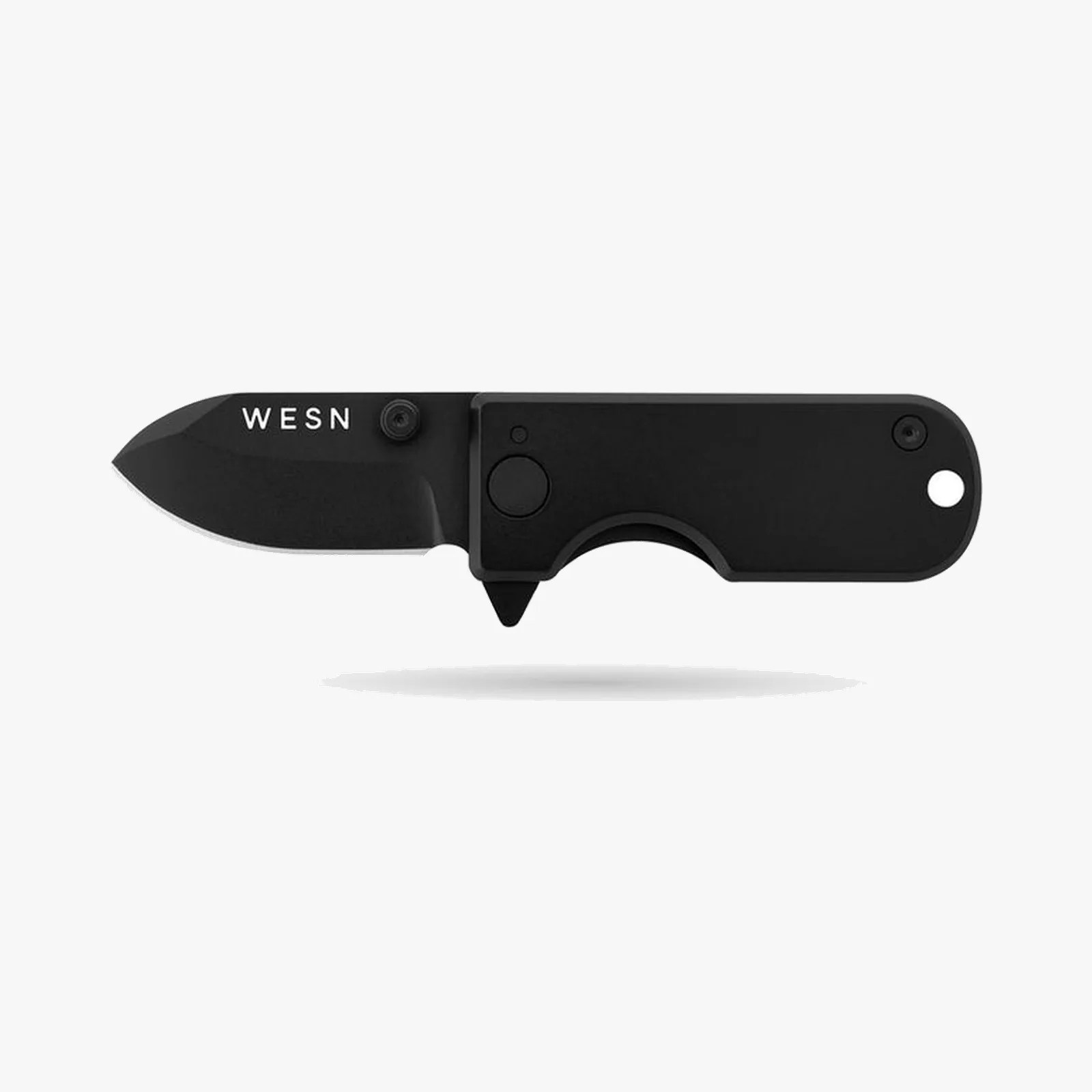 Black folding knife with a short blade and "WESN" logo on the blade.