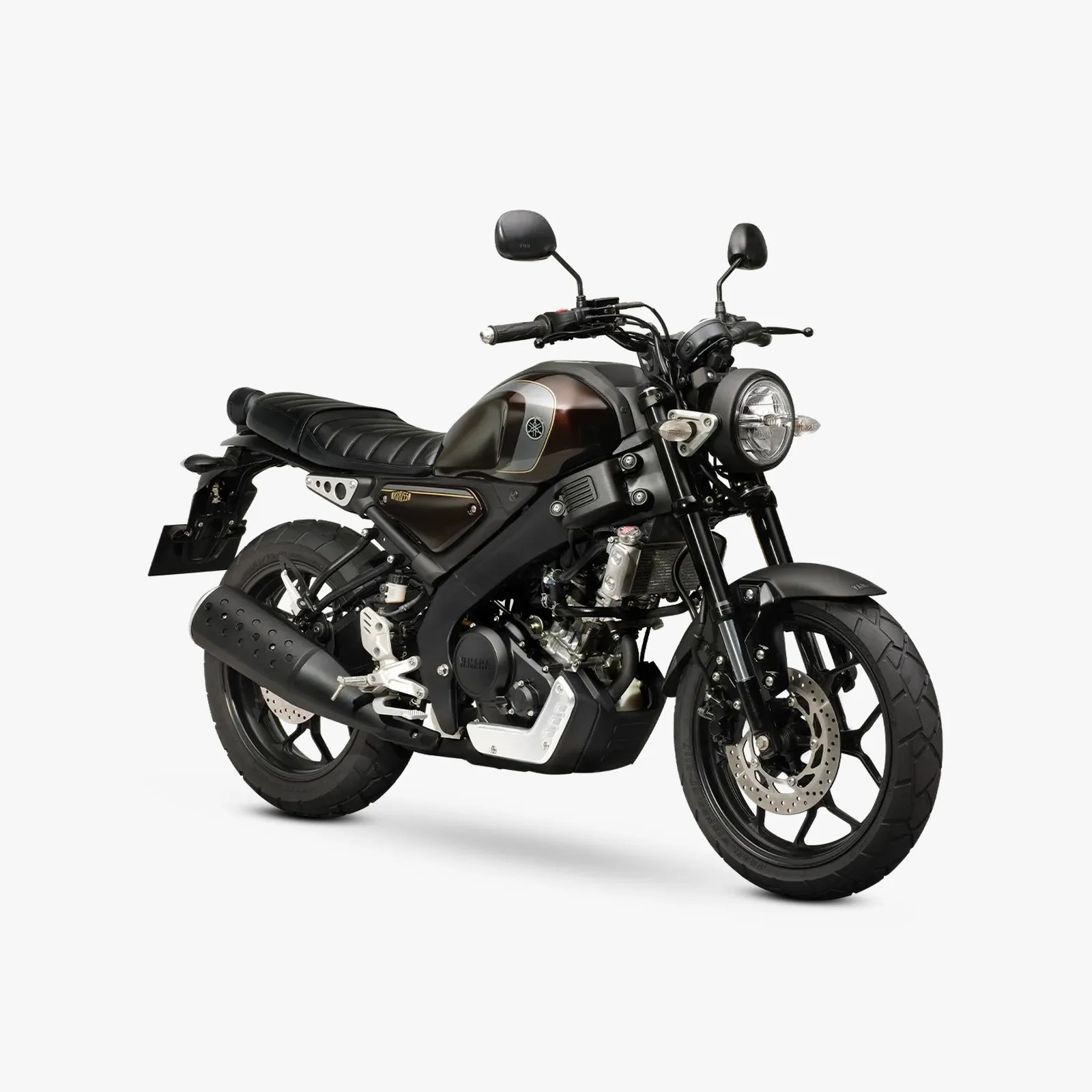 Black and brown Yamaha motorcycle with round headlight and black exhaust pipe on white background.