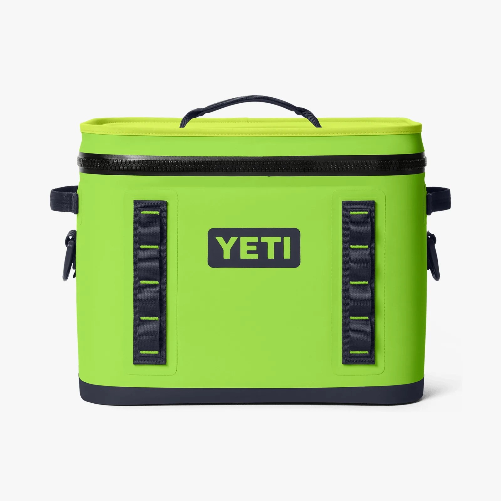 Bright green YETI soft cooler with black zipper, black base, and black webbing loops on front and sides.
