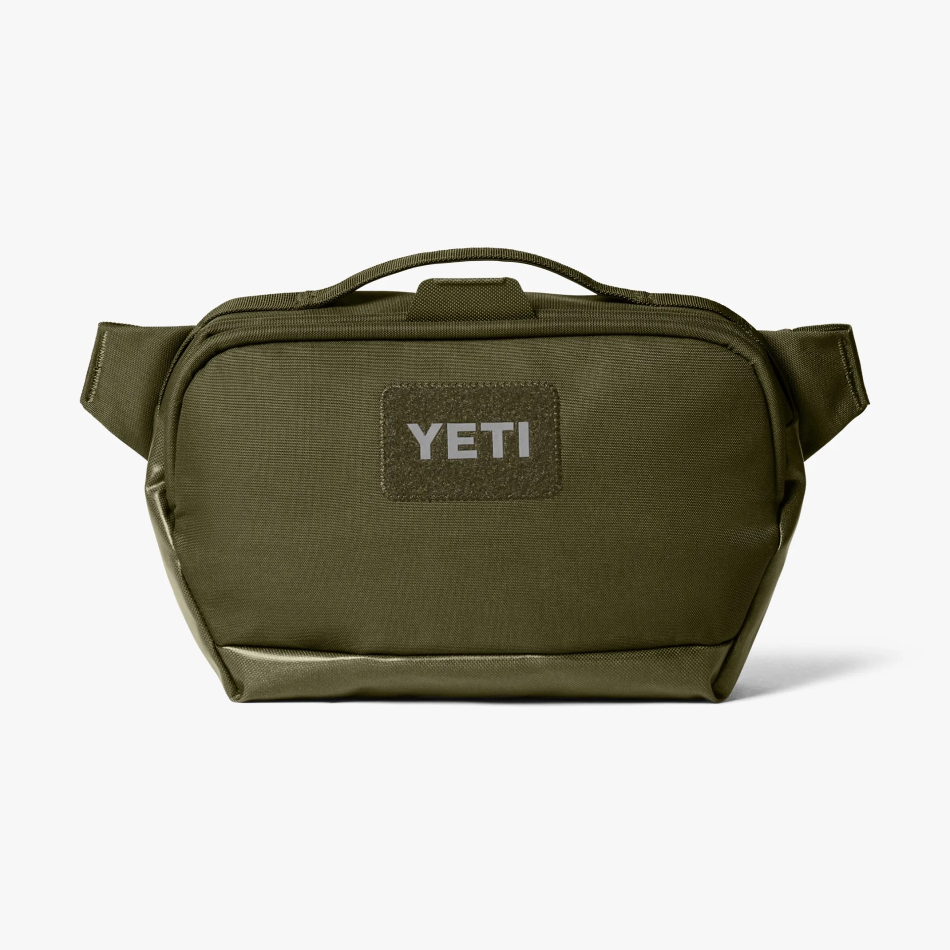 Olive green YETI soft-sided bag with top handle and front patch.