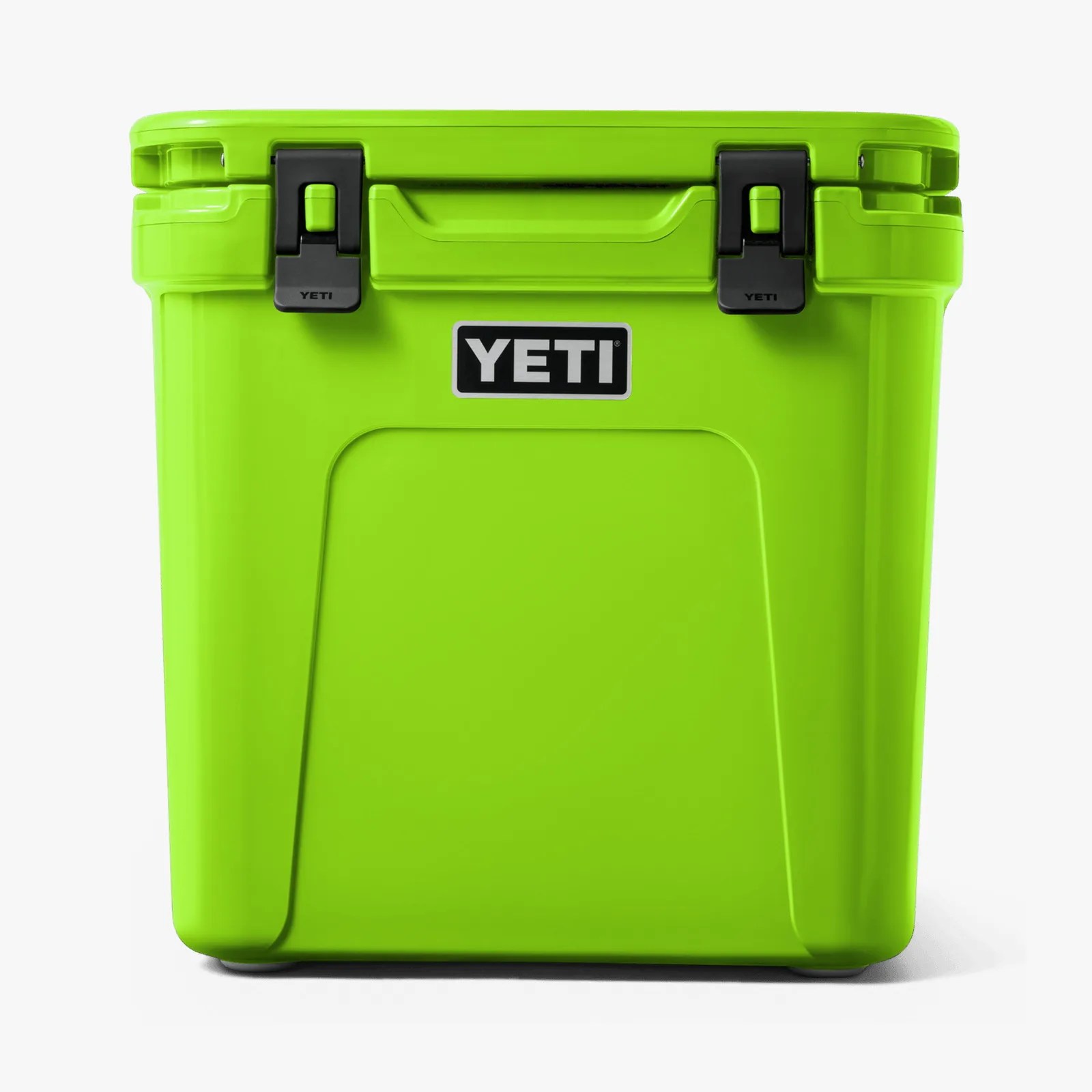 Bright green YETI cooler with black latches and a centered handle on a white background.