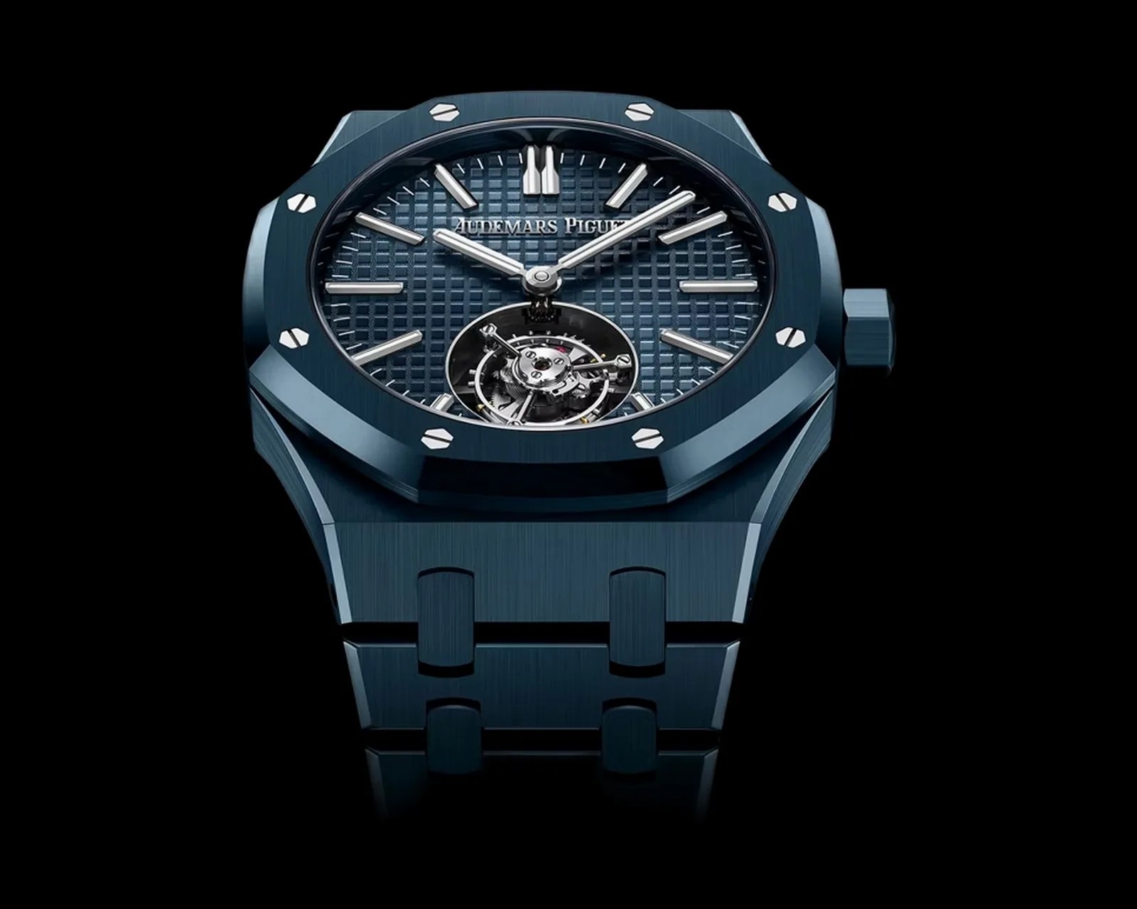 Blue Audemars Piguet Royal Oak watch with octagonal bezel, silver hour markers, and visible tourbillon mechanism.