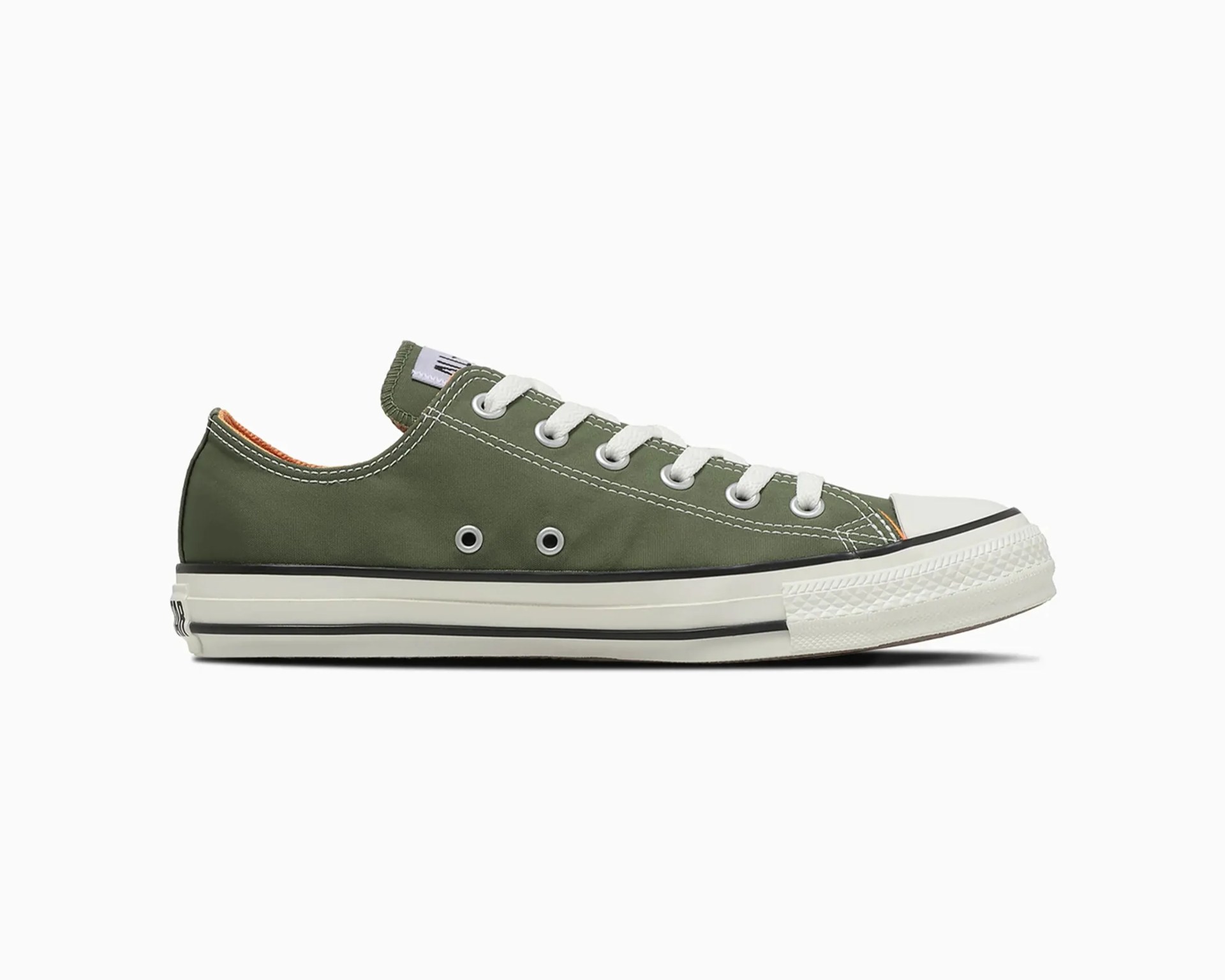 Low-top olive green canvas sneaker with white laces and rubber sole.
