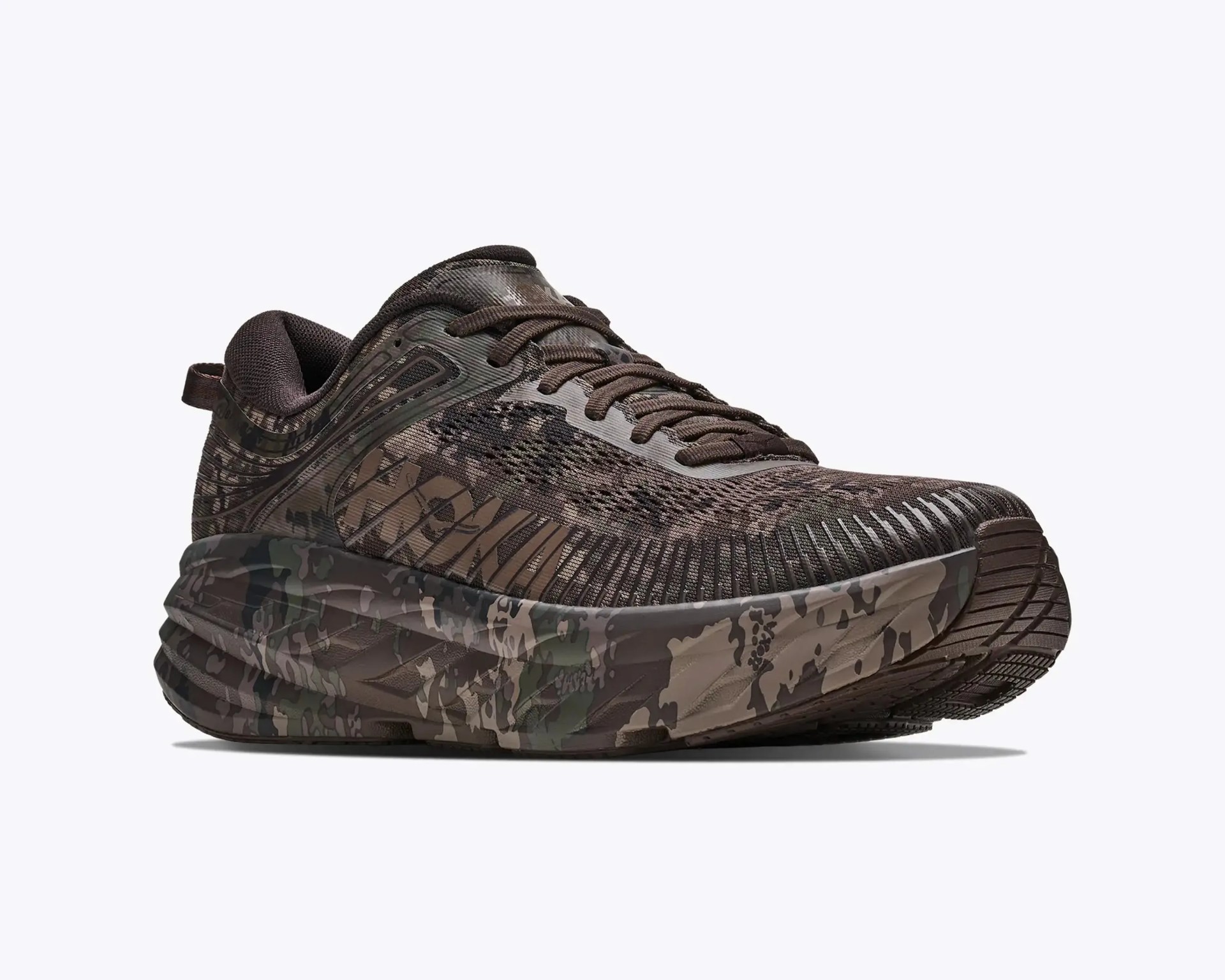Dark brown and black camo-patterned running shoe with thick sole and mesh upper.