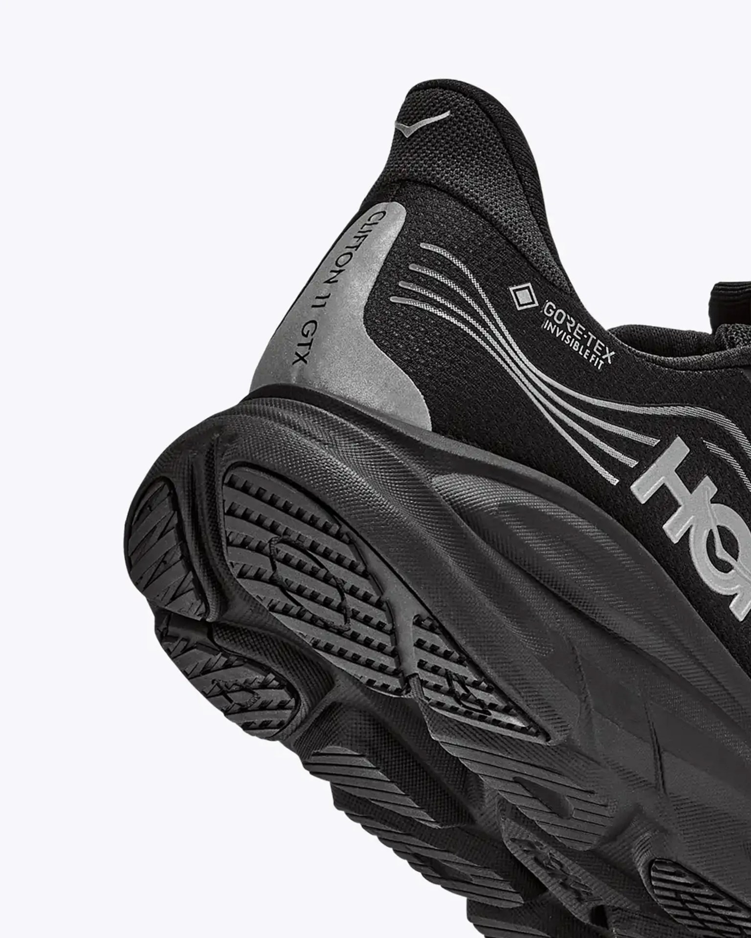 Black and gray Hoka Clifton 11 GTX running shoe with Gore-Tex Invisible Fit and textured sole.