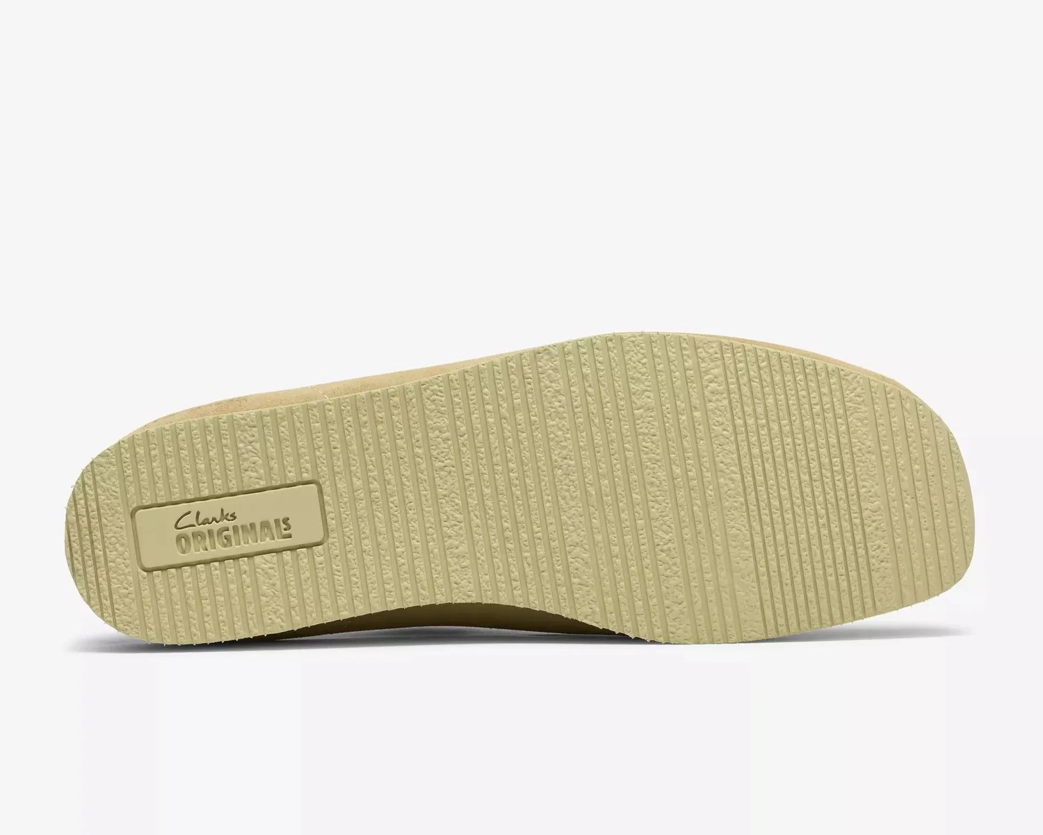 Beige rubber shoe sole with "Clarks Originals" logo embossed near the heel.