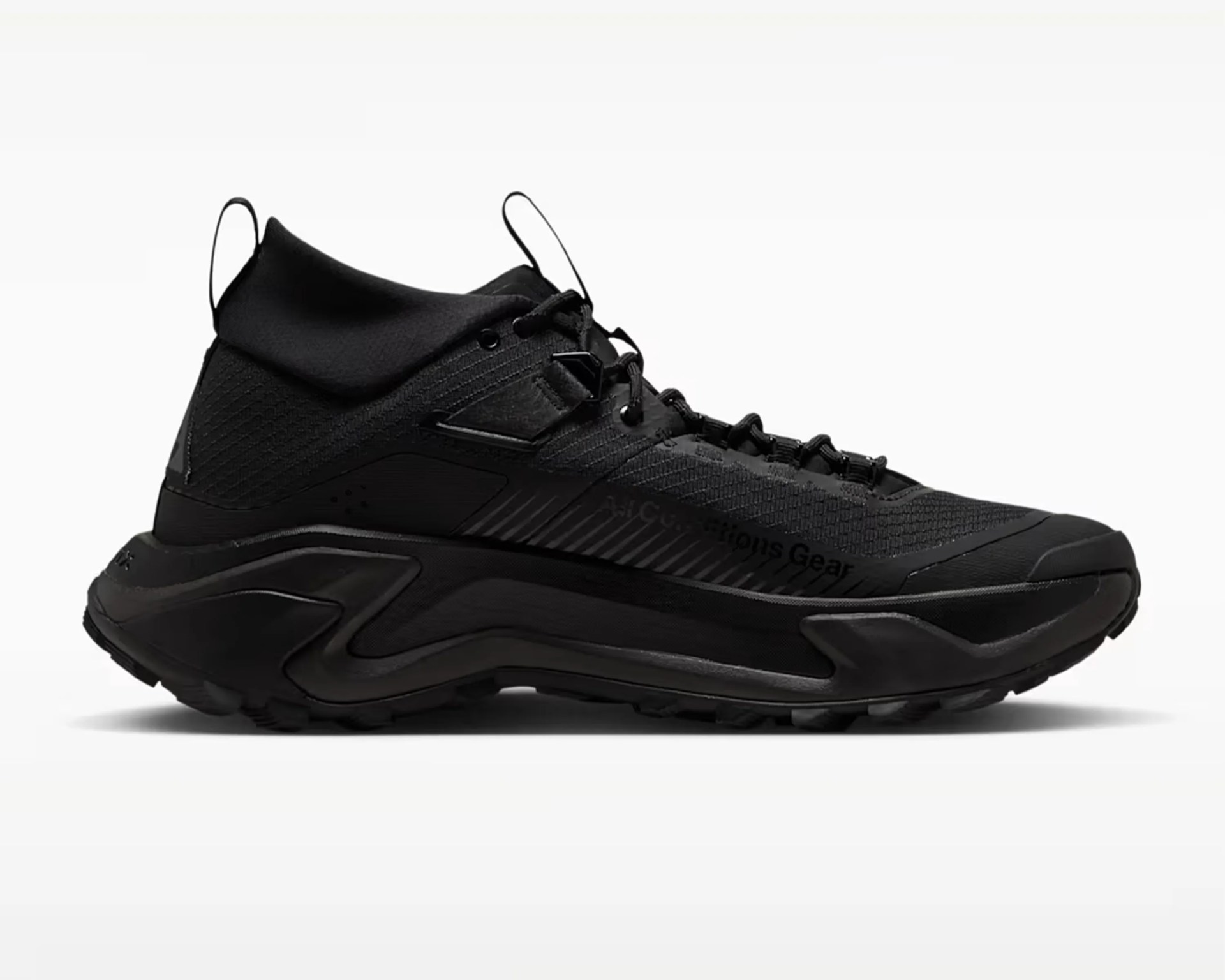 Black high-top athletic sneaker with textured fabric upper and thick cushioned sole.
