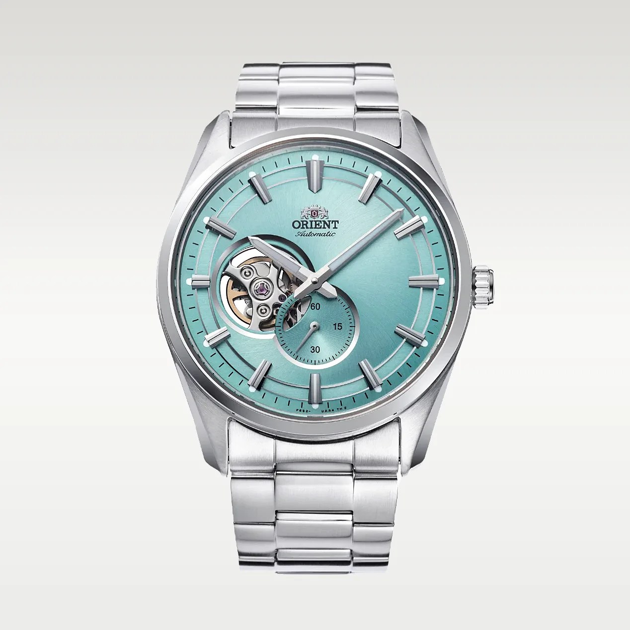 Silver stainless steel wristwatch with turquoise dial, open-heart design, and subdial at 6 o'clock.