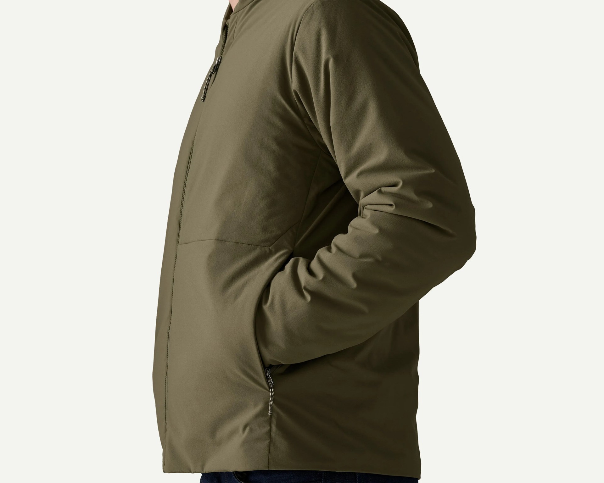 Olive green zip-up jacket with side pockets worn by a person.
