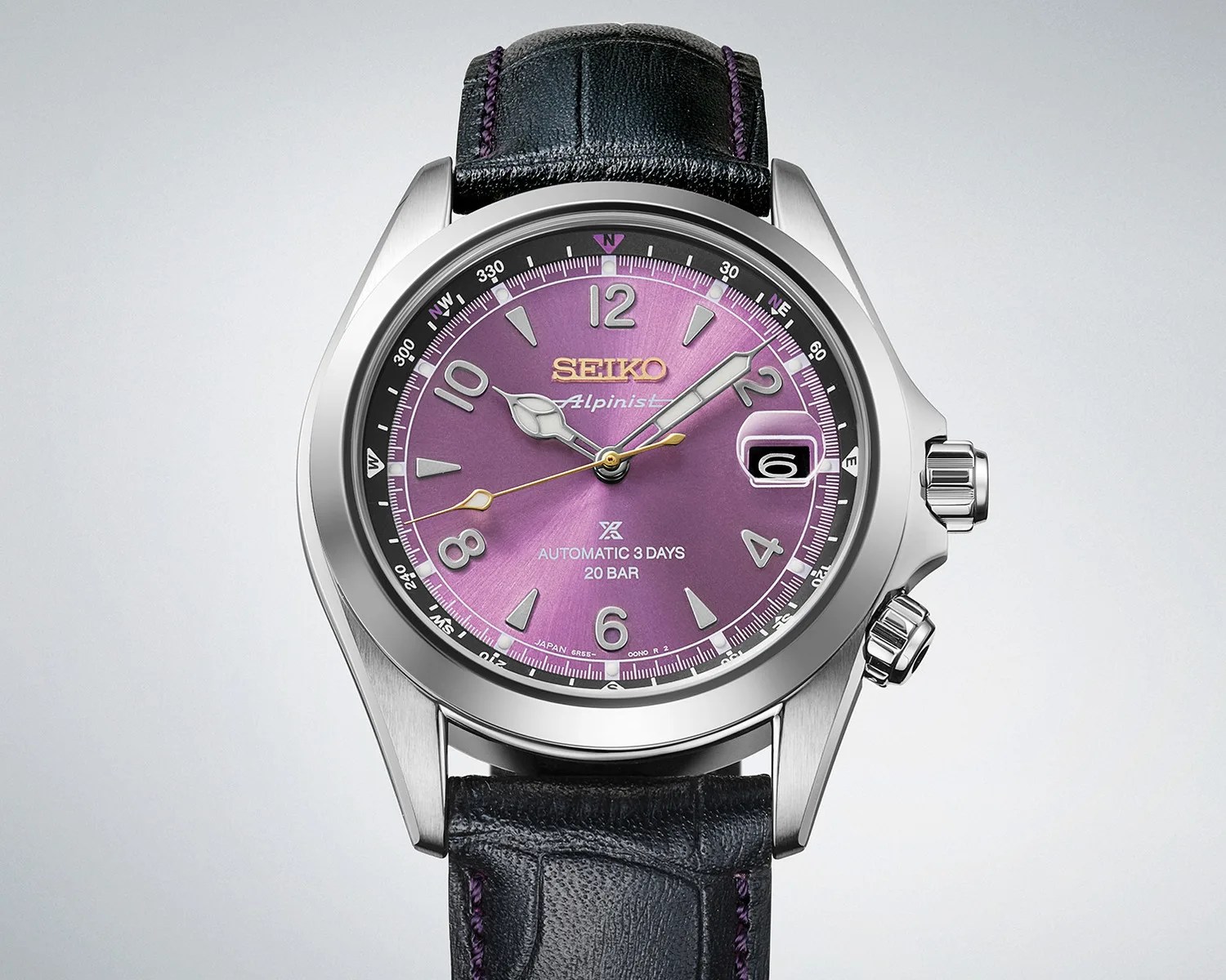 Seiko Alpinist watch with purple dial, silver case, black leather strap, and date window at 3 o'clock.