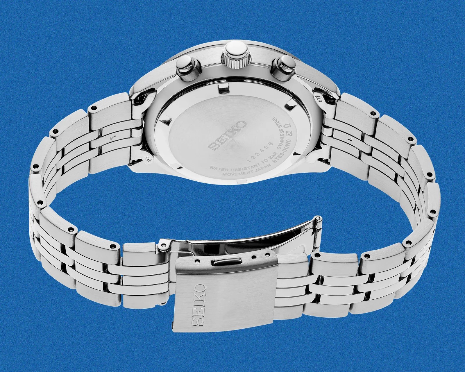 Silver stainless steel Seiko watch with a metal link bracelet and a clasp, shown from the back.