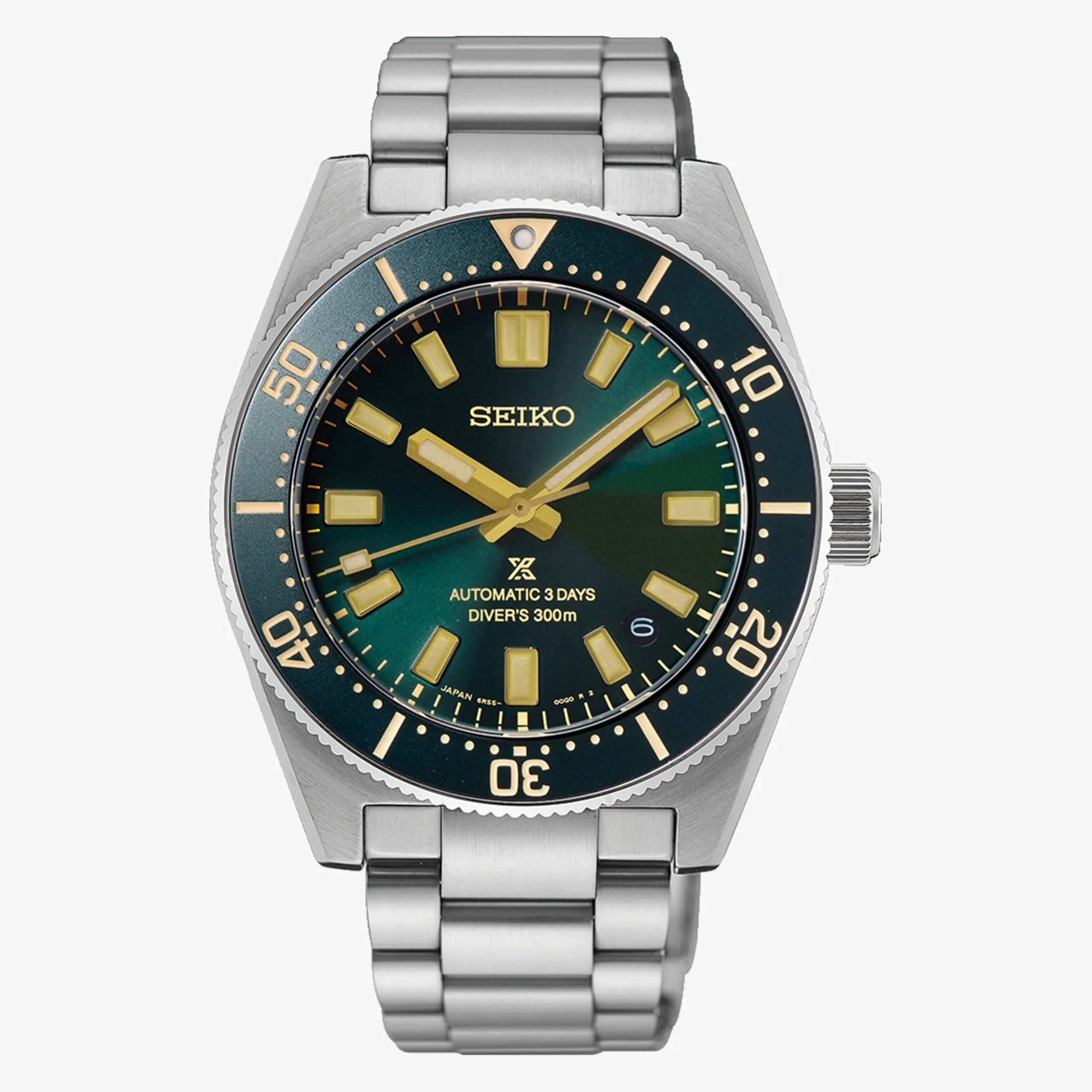 Stainless steel Seiko diver's watch with green dial, gold-tone markers, and rotating bezel.