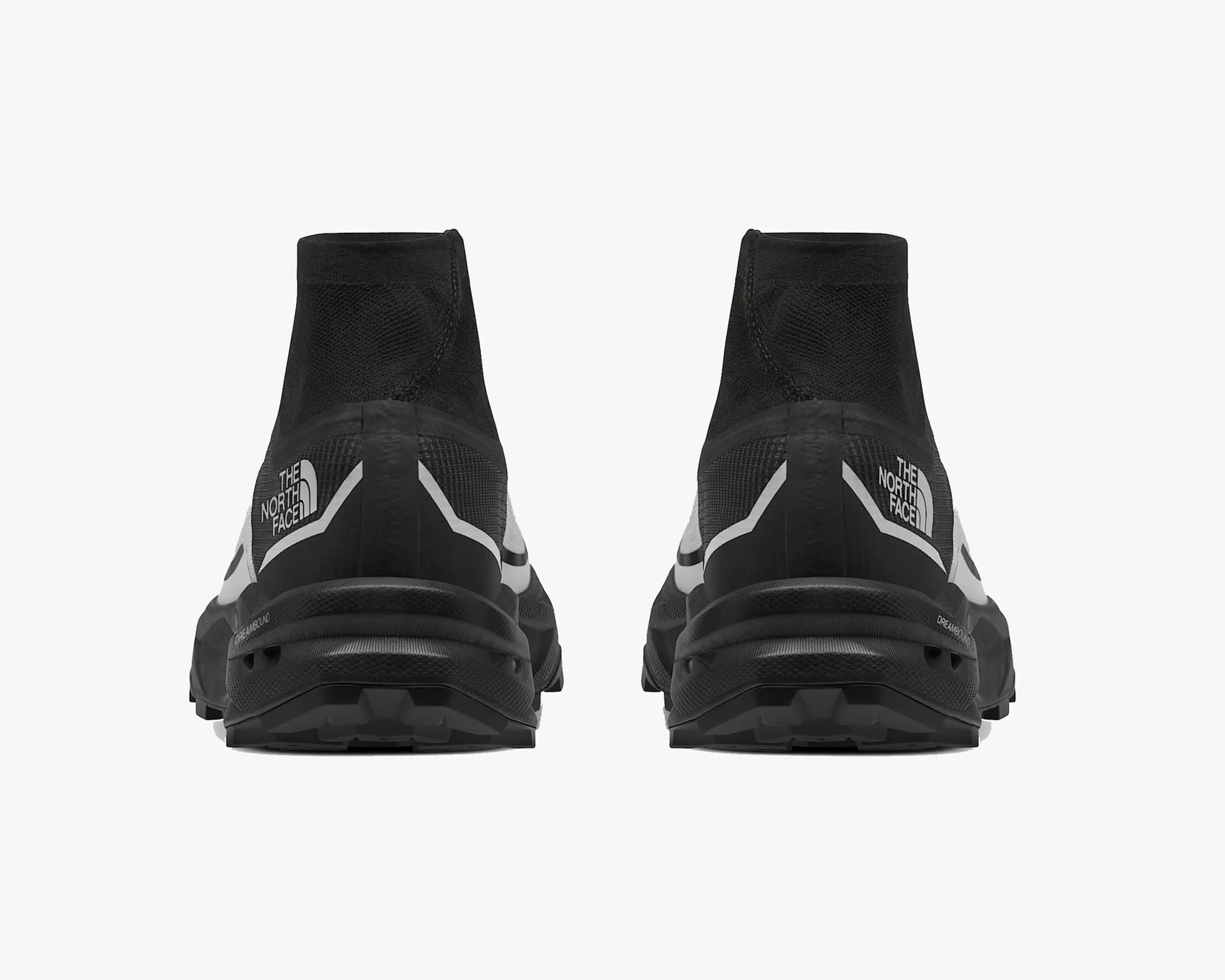 Pair of black and white The North Face high-top sneakers shown from the back.