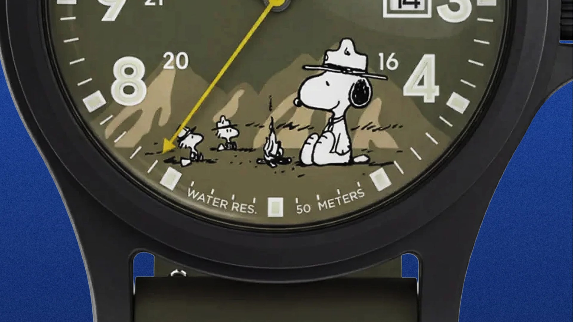 Close-up of a watch face with Snoopy characters camping illustration, black case, and yellow second hand.