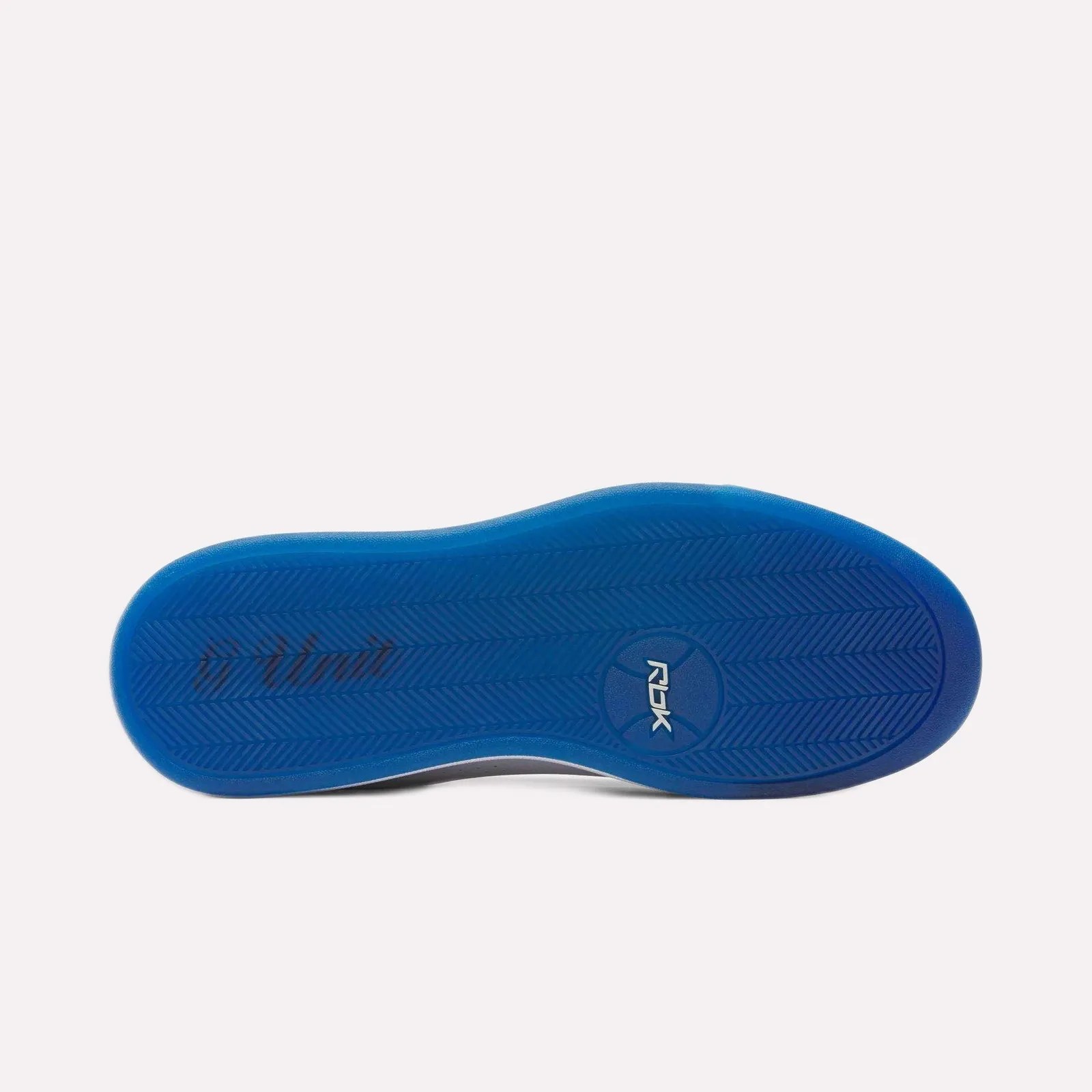 Blue rubber sole of a shoe with "ROCK" logo in the center.
