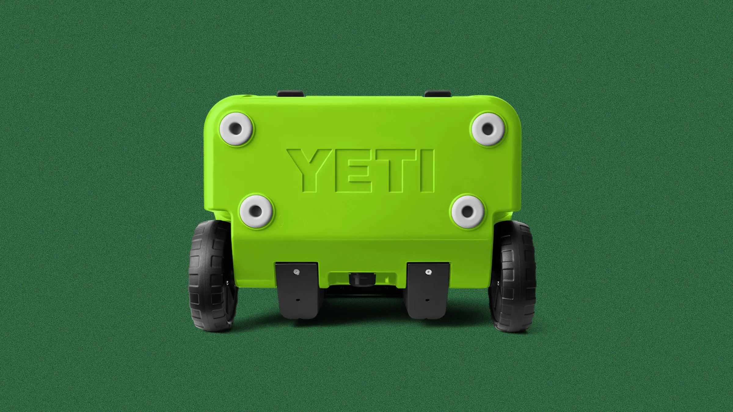 Bright green YETI cooler viewed from the bottom showing four white feet and two black wheels on a green background.
